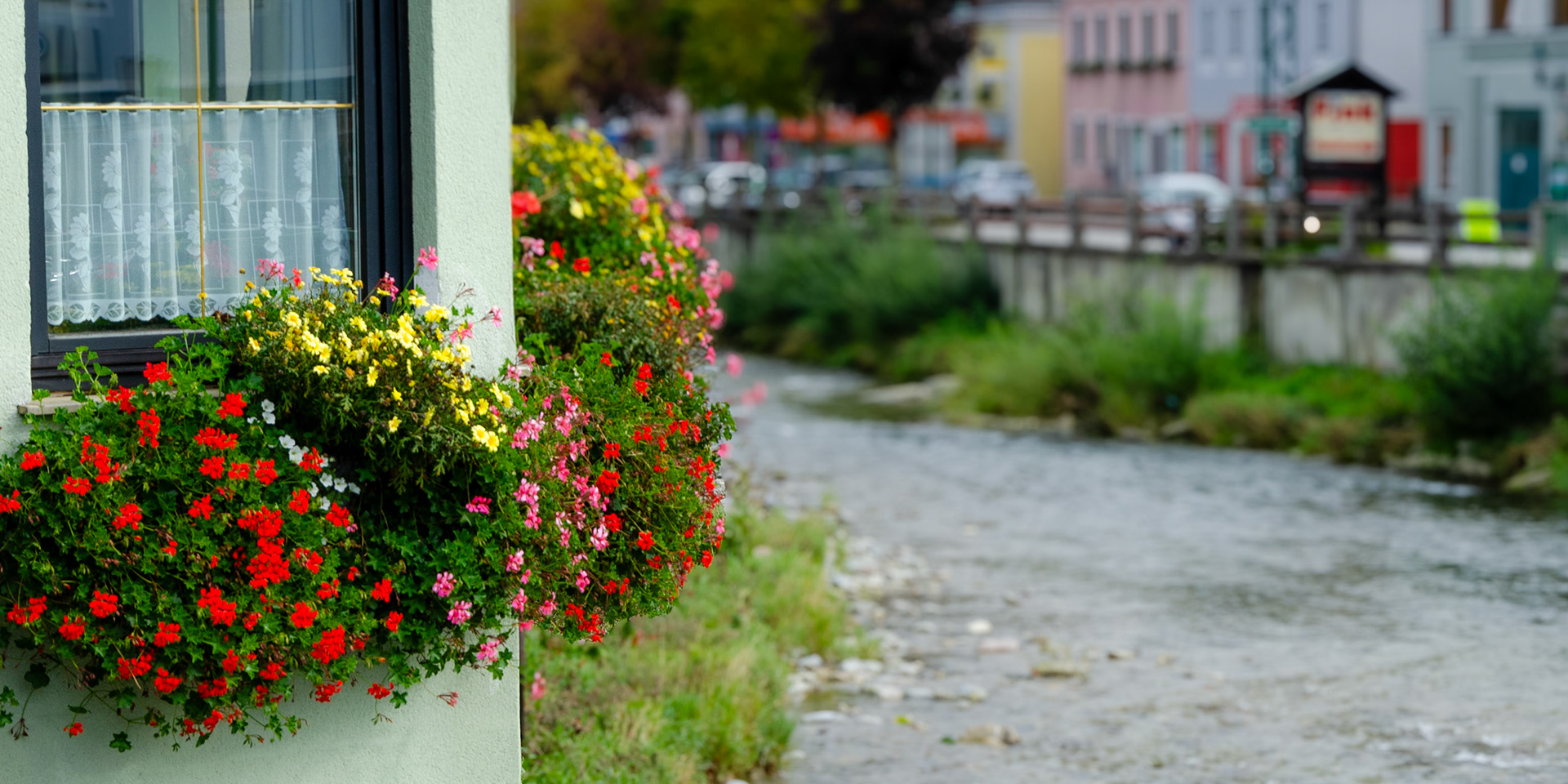 Kirchberg river colorful flower boxes