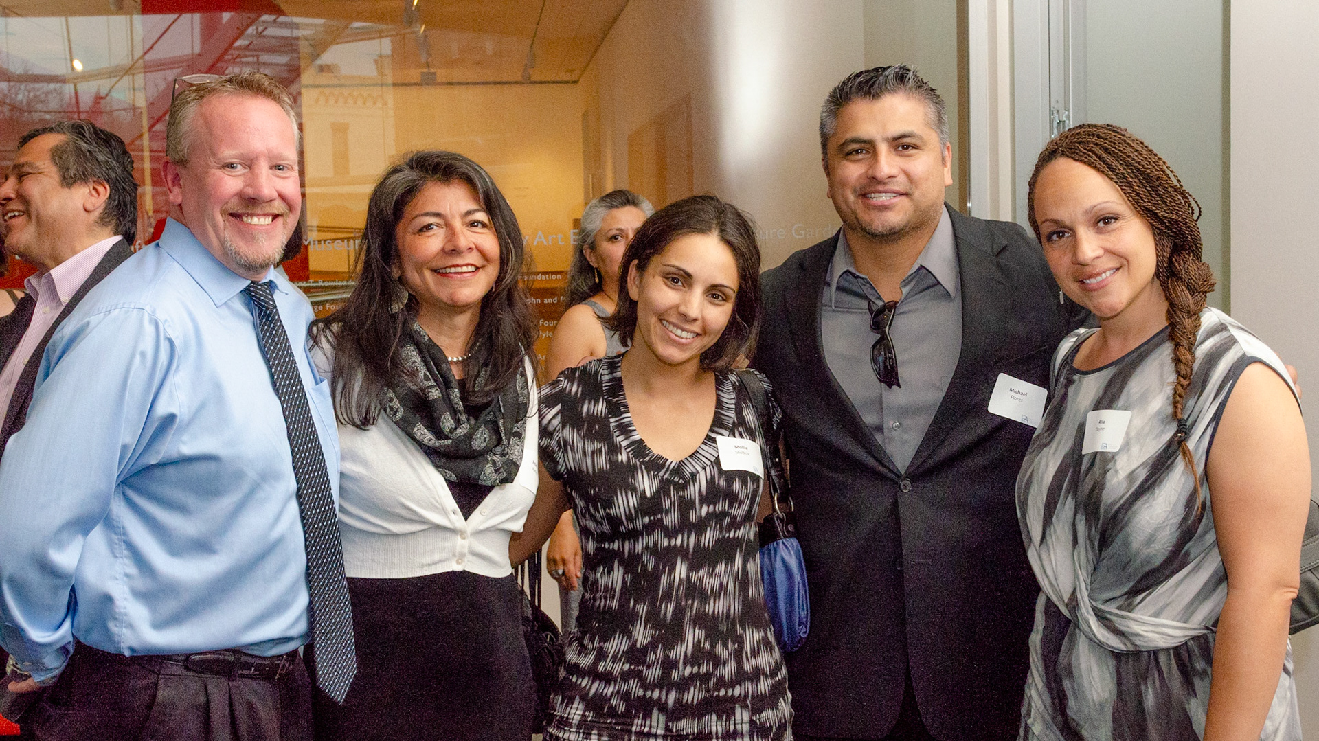 Event goers pause for a quick snapshot