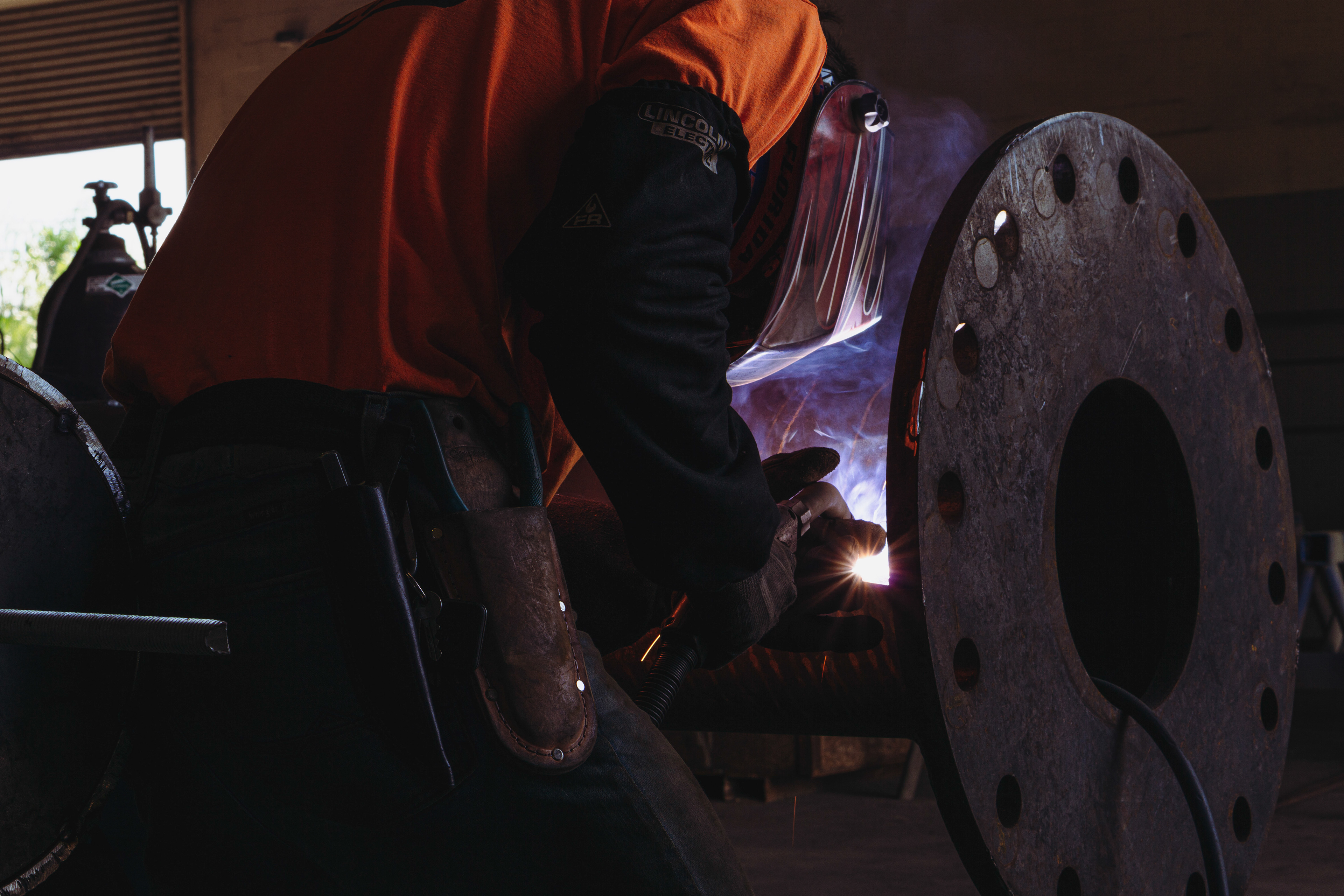 Behind the welder, better view of welder gear and working position