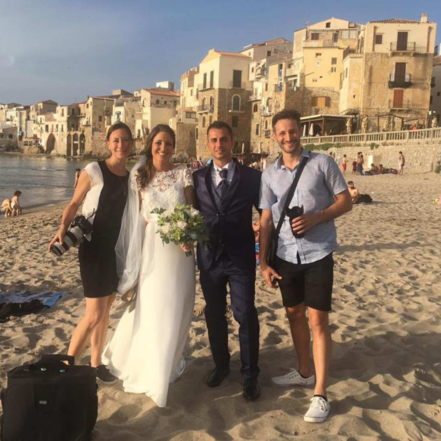 Linda and Piero with bride and groom