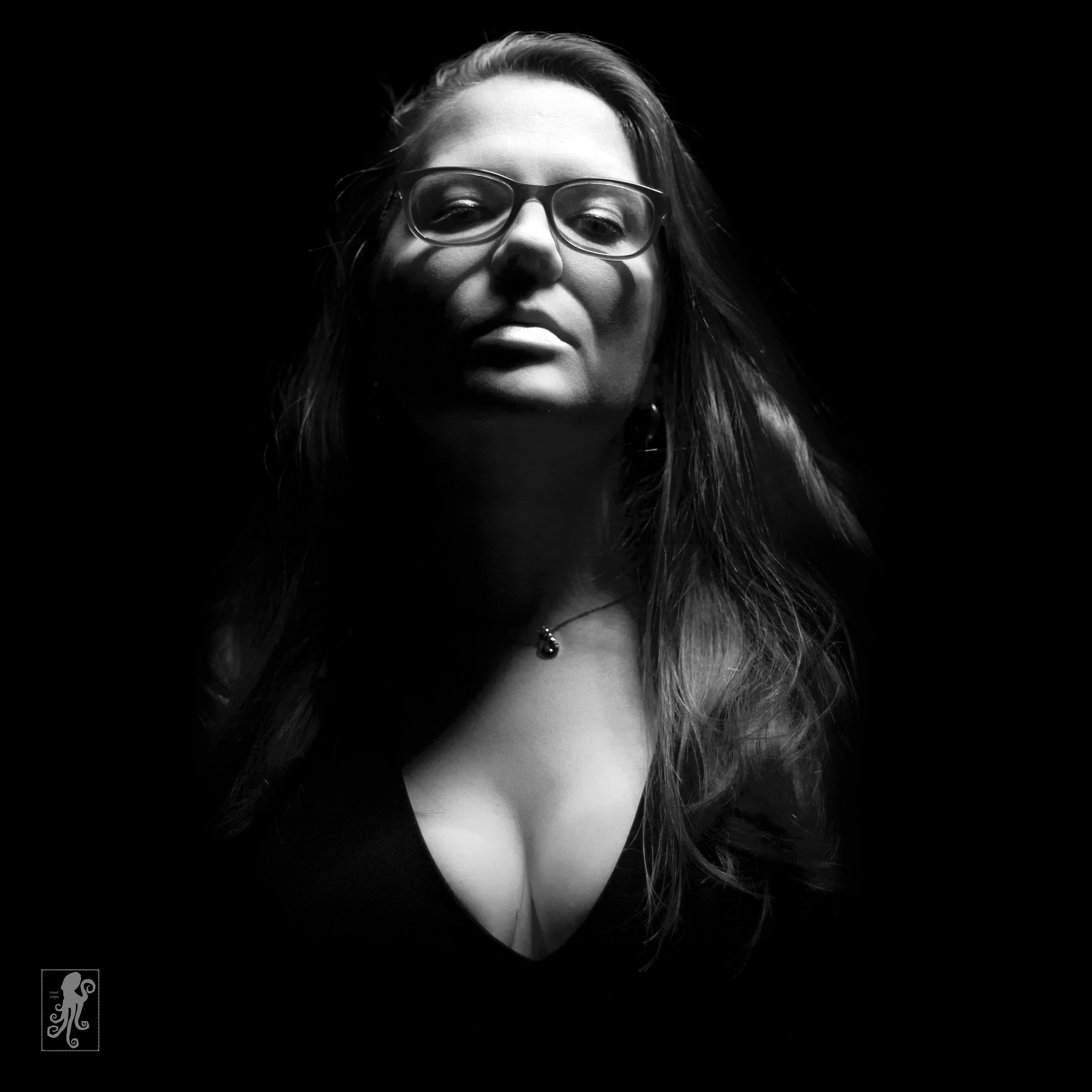 a very moody film noir style image of comedian and improvisor Emma Cusdin, known for her work at Scared Scriptless and now at Perfuct Storm