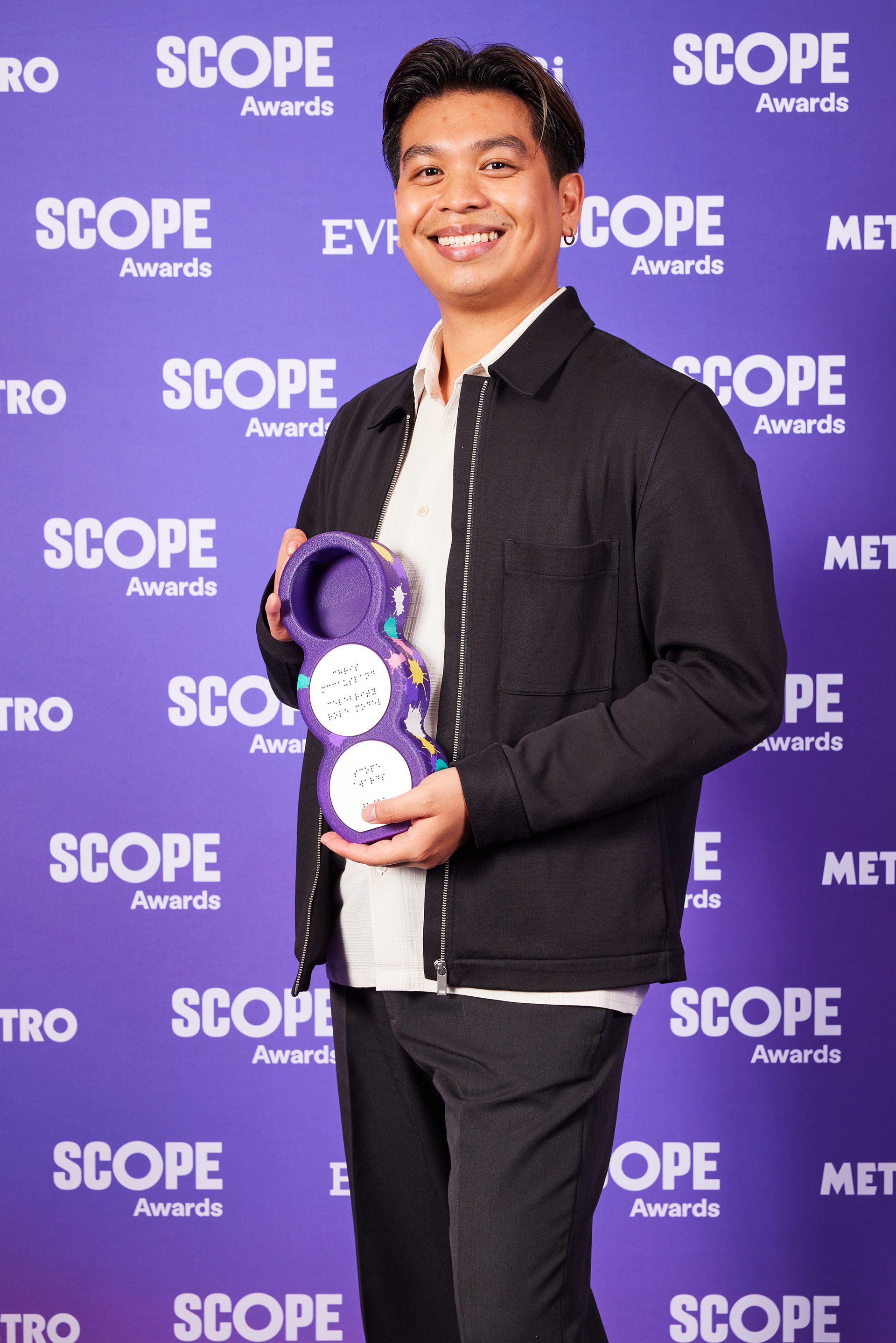 Co-produced and accessible Scope Awards 2025 trophy Braille side