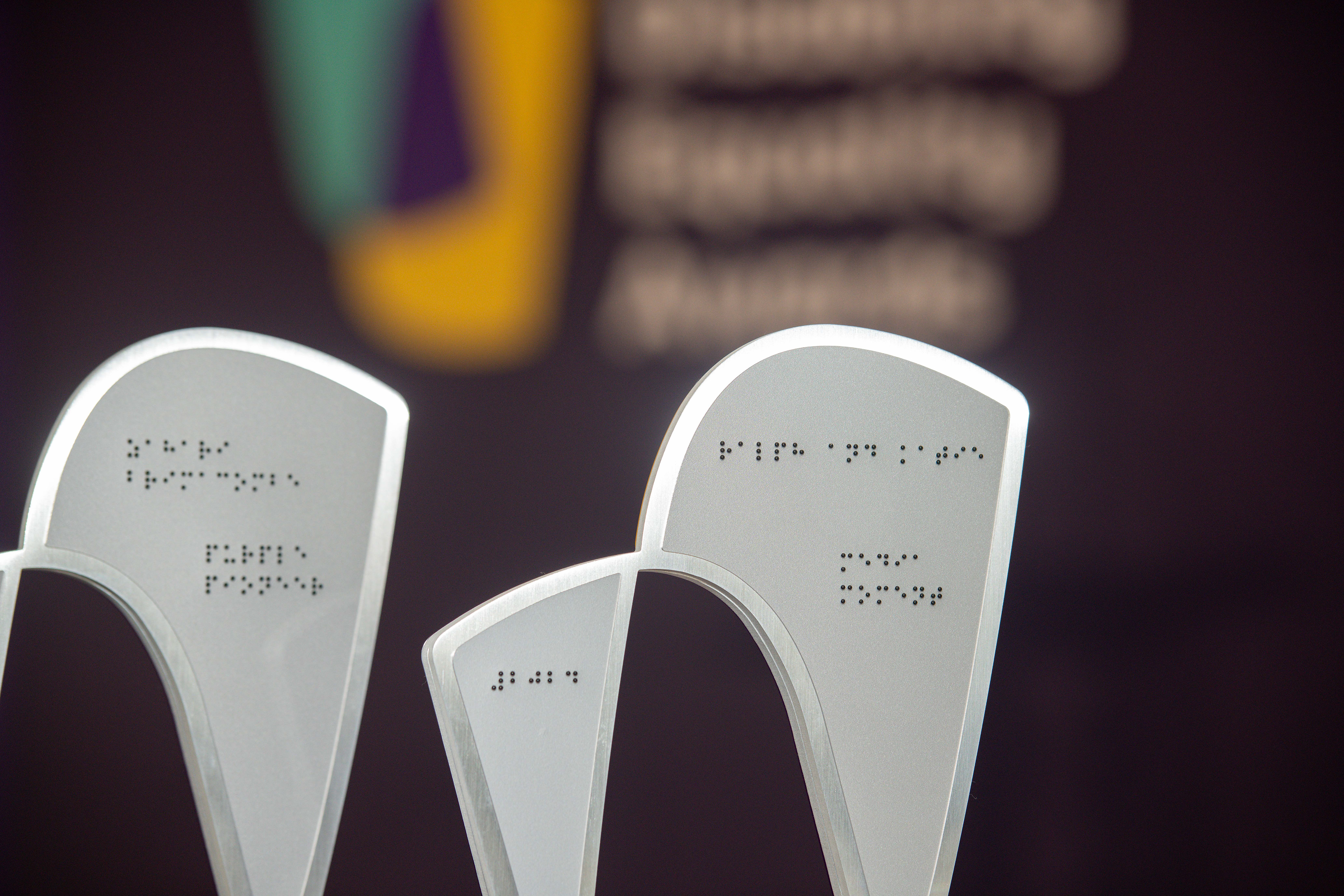 Co-produced and accessible 2024 Scope Awards trophy, Braille side