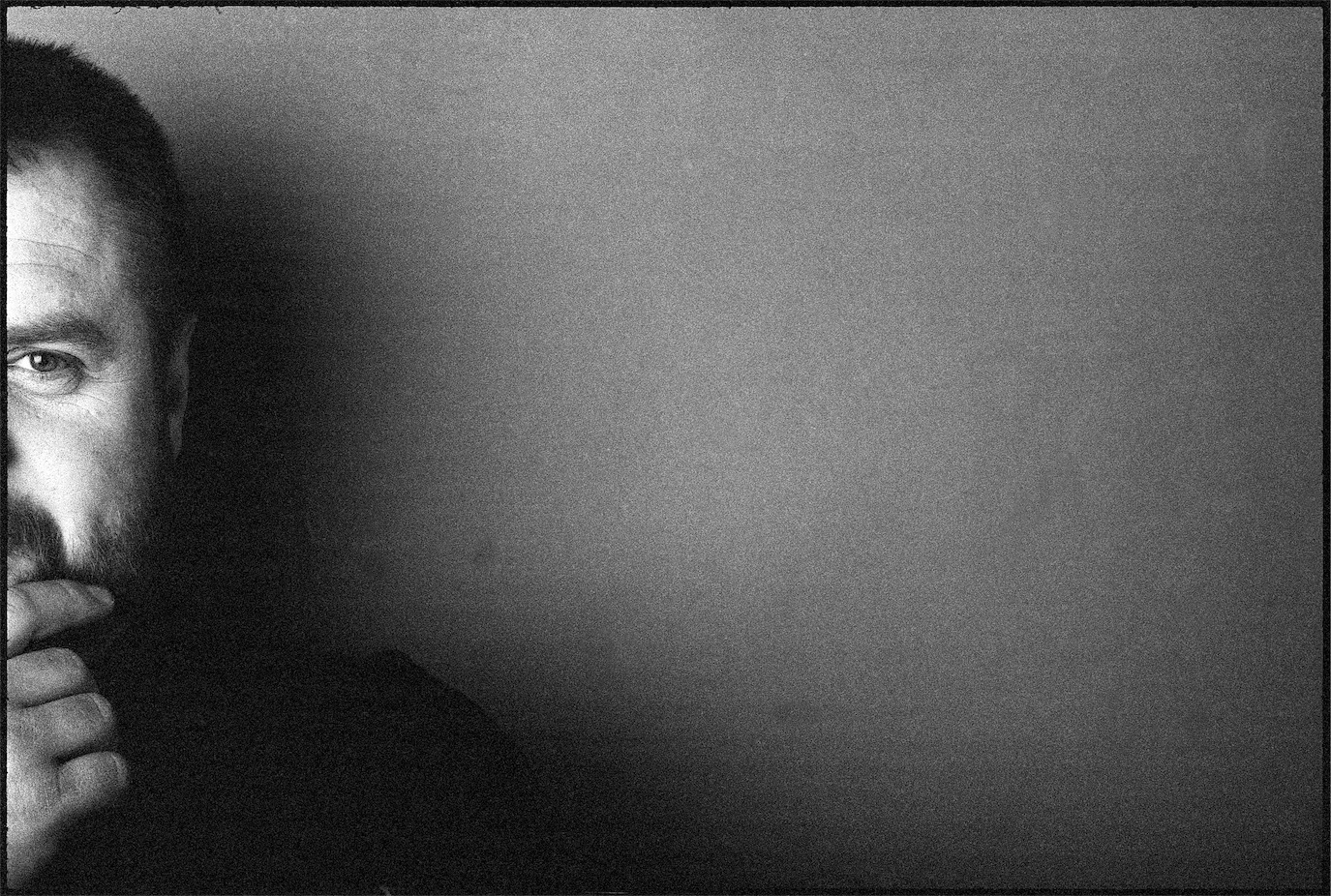 Cristi Tabără cropped at the far edge of a grainy black-and-white frame, photographed by Alex Gâlmeanu.