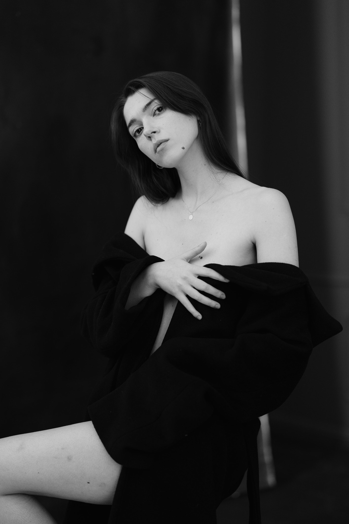 Black-and-white portrait of actor Victoria Ecaterina Moraru seated with a dark wrap around her shoulders, photographed by Alex Gâlmeanu.