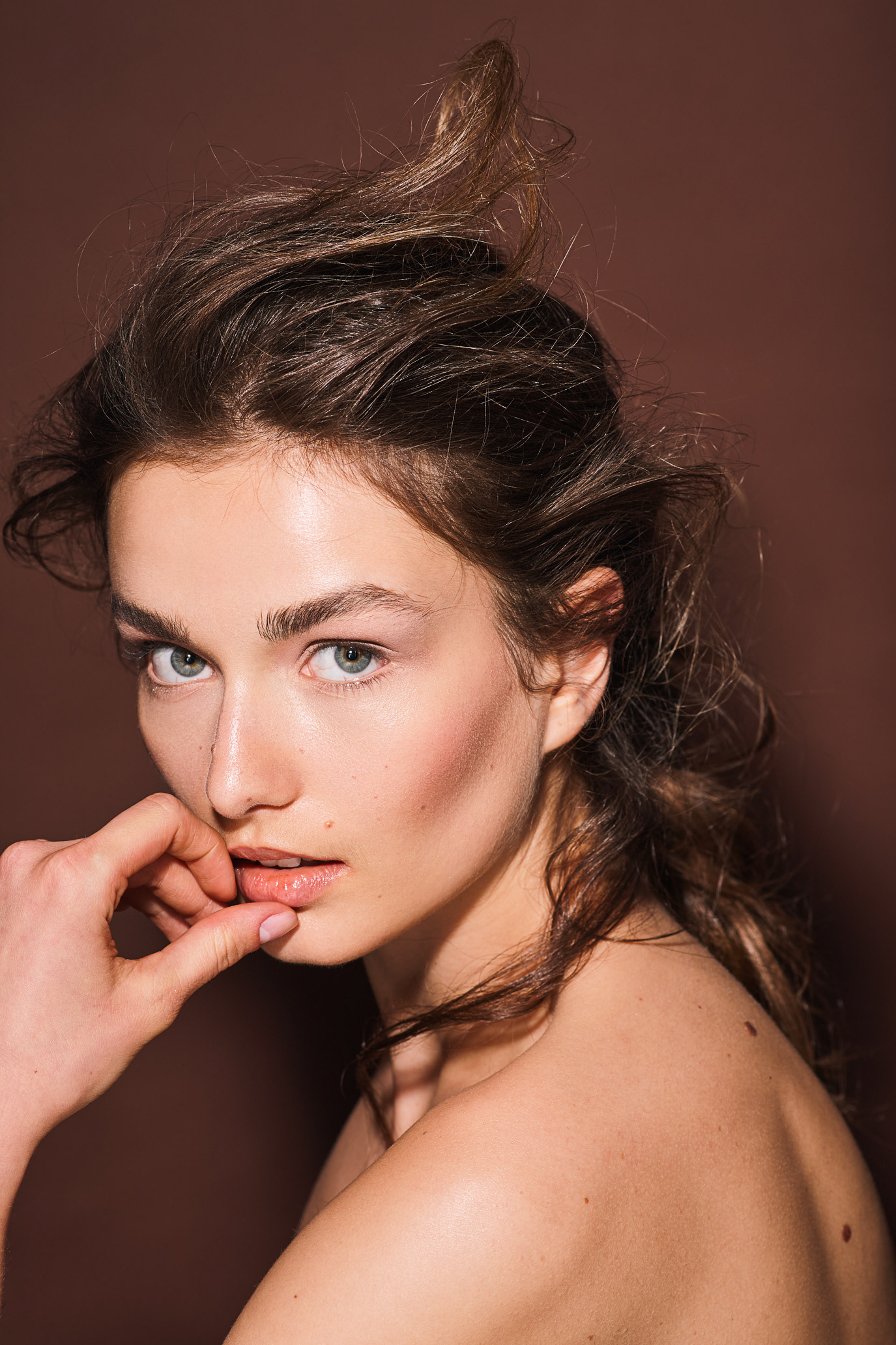 Close-up beauty portrait of Andreea Diaconu for Harper’s Bazaar Romania, photographed by Alex Galmeanu.