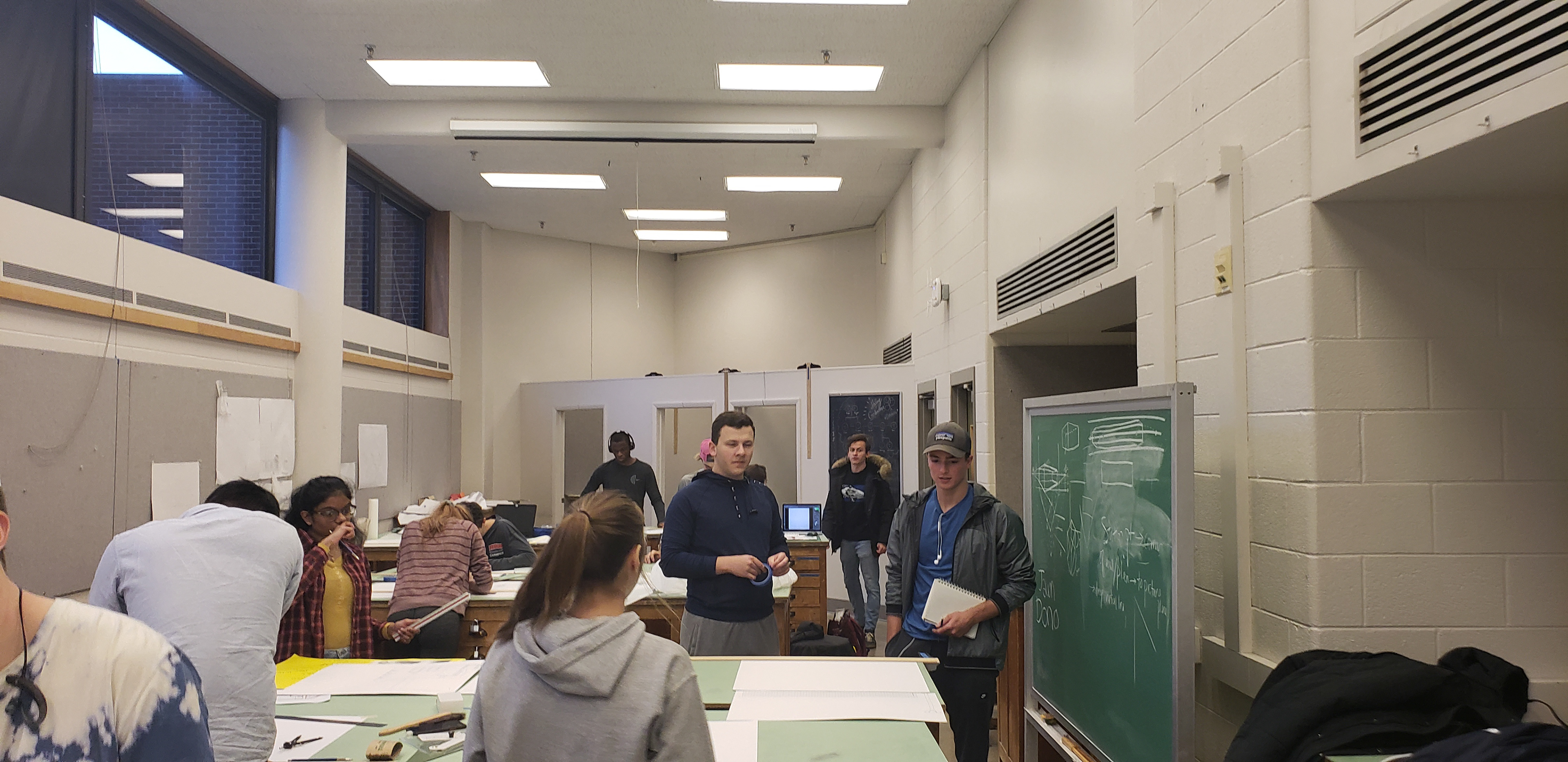 A picture of the space irl, complete with moderately stressed architecture students.