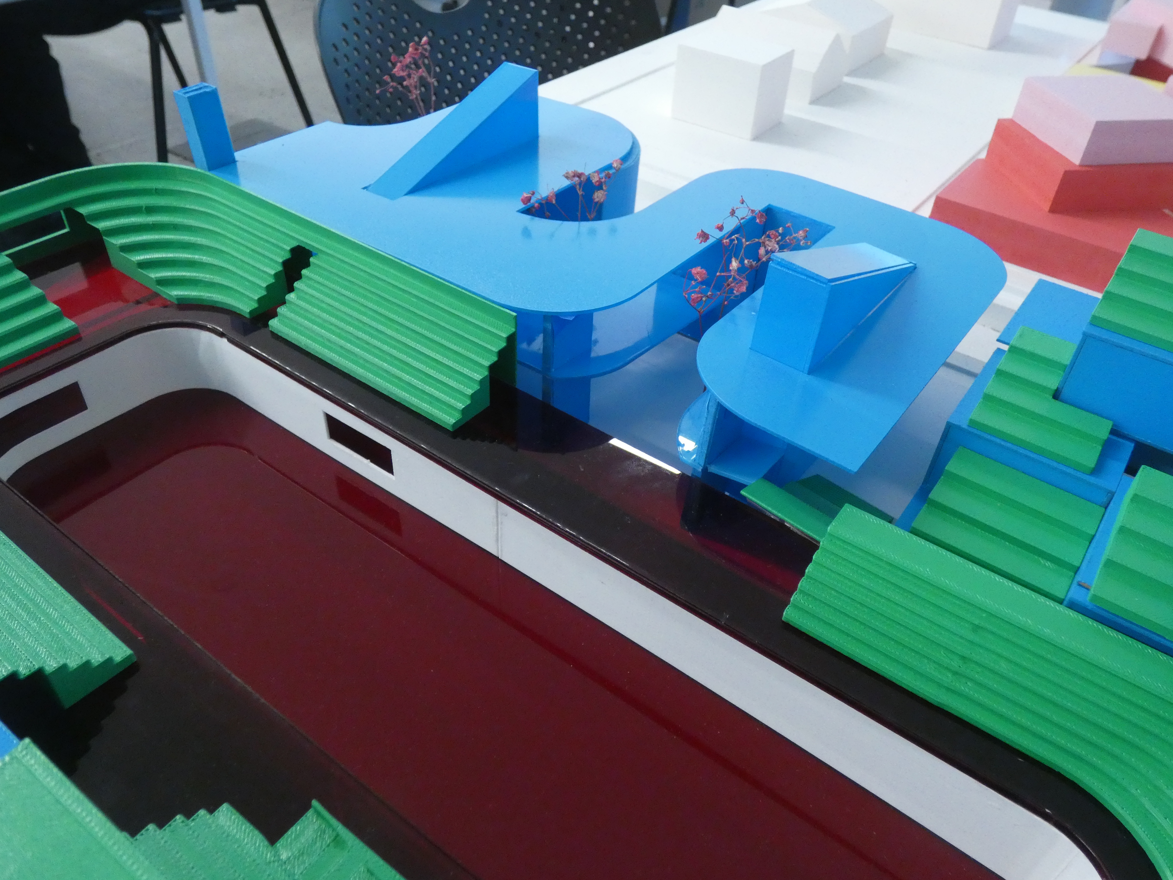 Closeup shot of my jester building and the connection to the other spaces as well as the central rodeo space. 