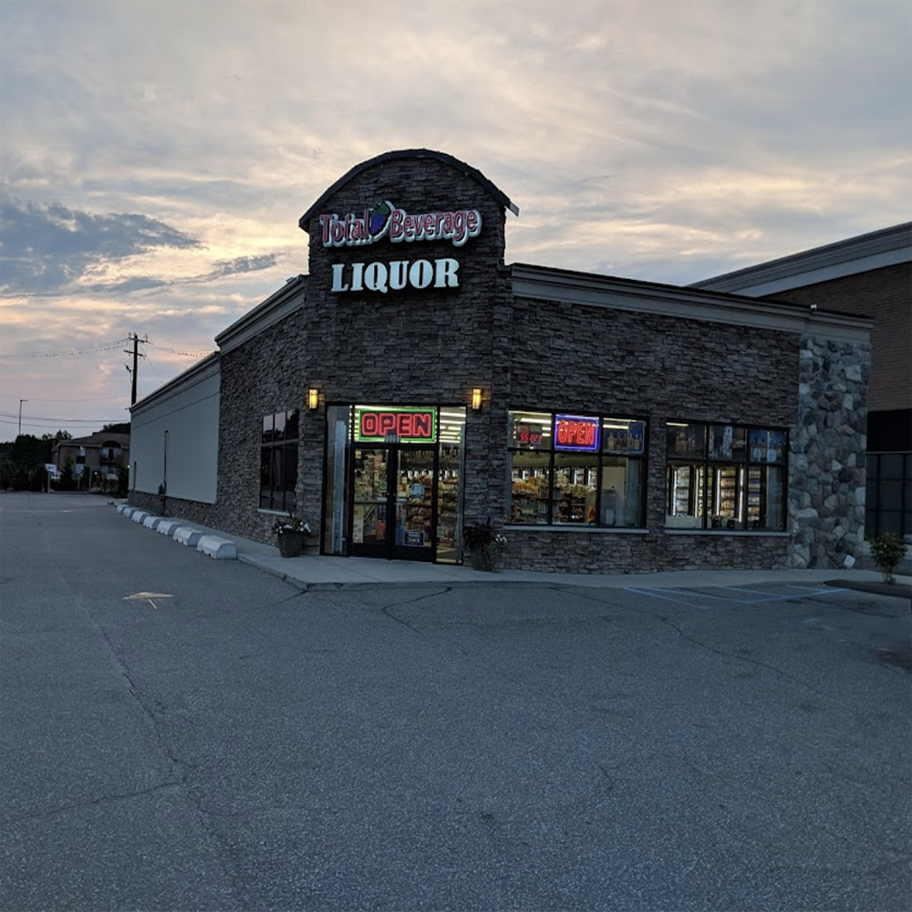 This one story, open plan building is located at Southfield Rd. in west Southfield, MI. This building contains a liquor store, and its walls are made up of concrete blocks with various facades (such as brick and cobblestone) overlaying them. The flat roof is made up of corrugated aluminum sheeting resting atop internal Pratt trusses coupled with waterproofing membrane and metal coping.