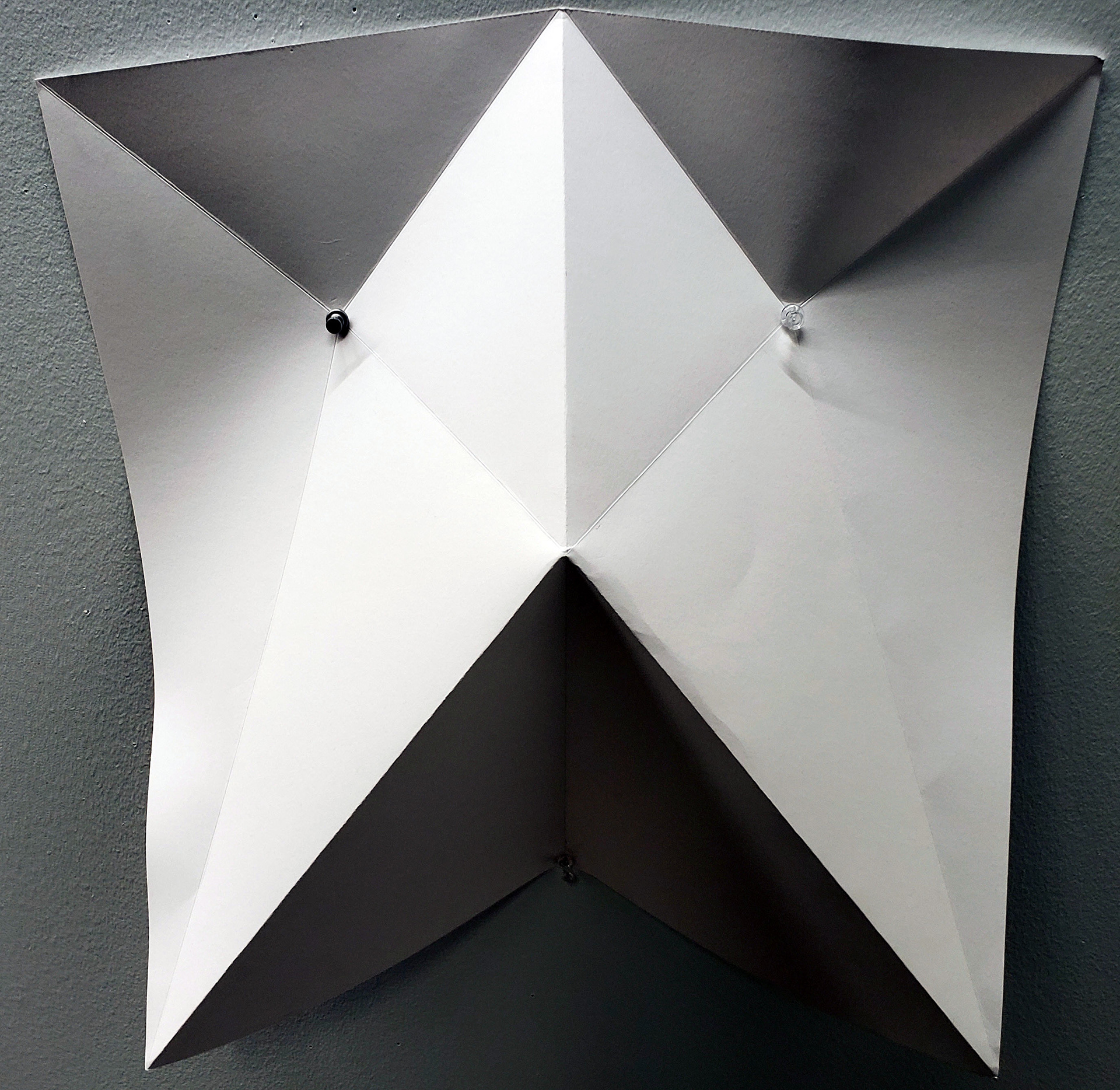Image of the physical folded paper tesselation after numerous iterations.