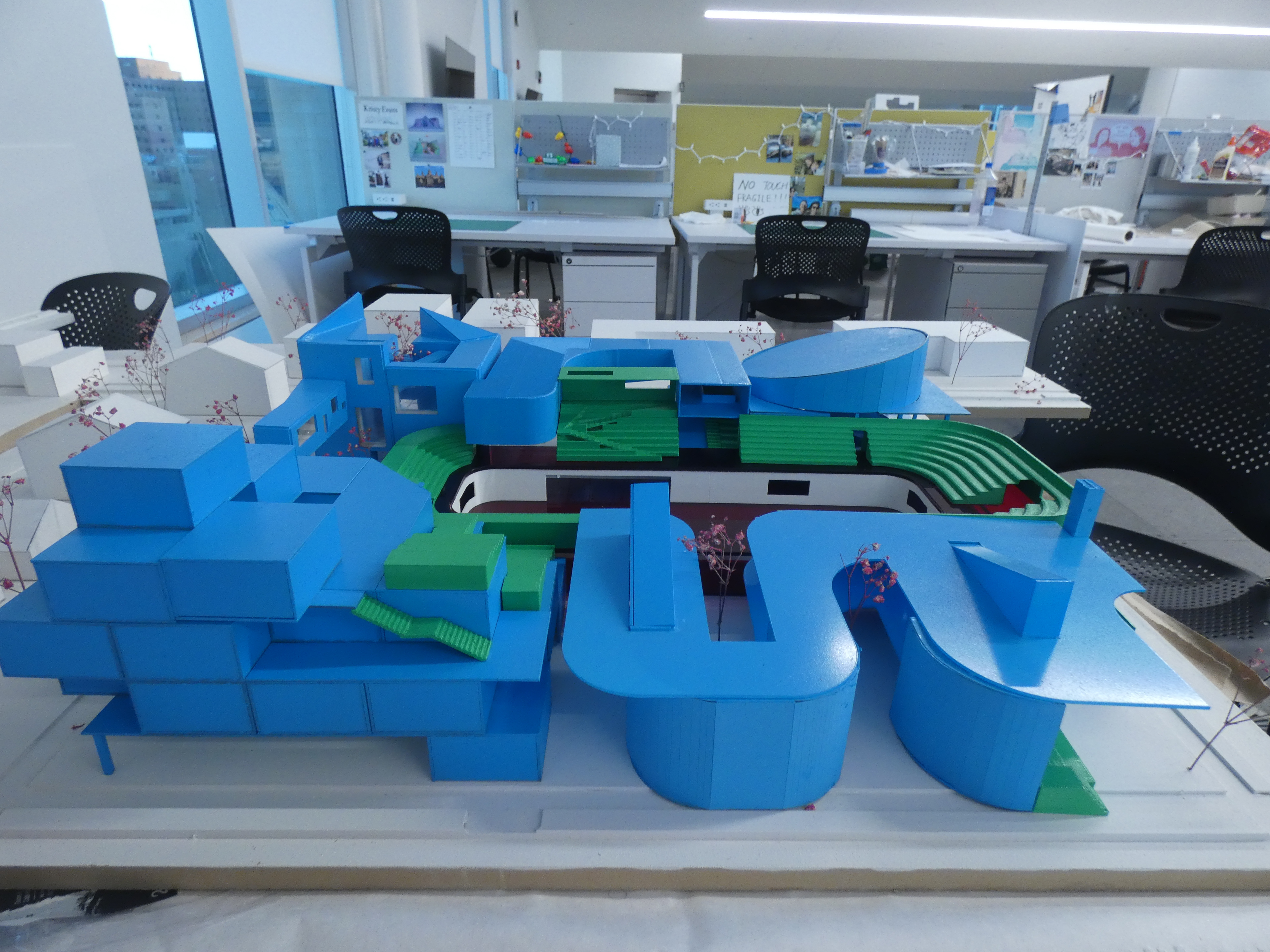 Street view of our team's massing model .