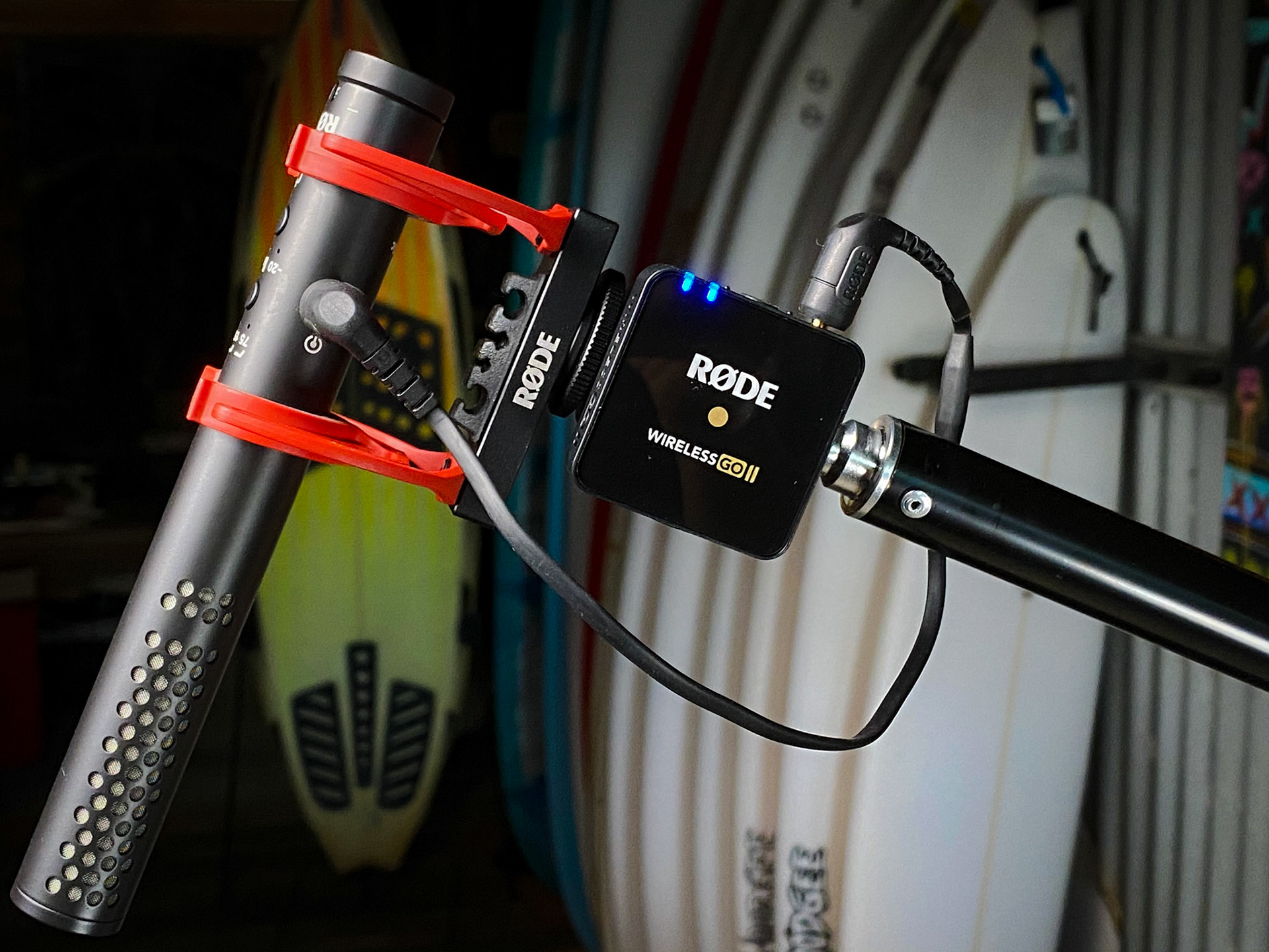 A Rode VideoMic NTG plugged into a Rode Wireless GO II positioned above the interviewee for wireless audio recording