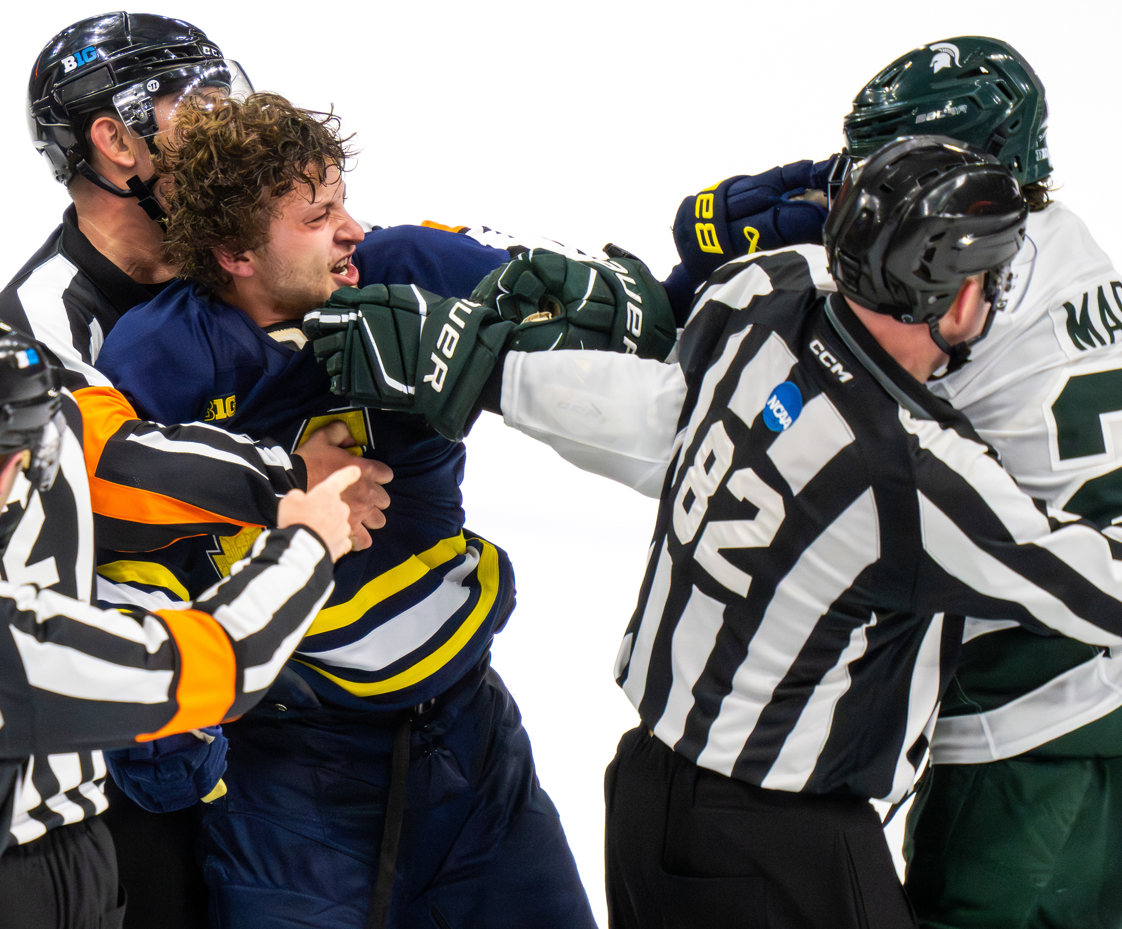 Players from Michigan and Michigan State get into a brawl during a hockey game at Munn Ice Arena in East Lansing,  Michigan, on Friday, Dec. 5 2025.