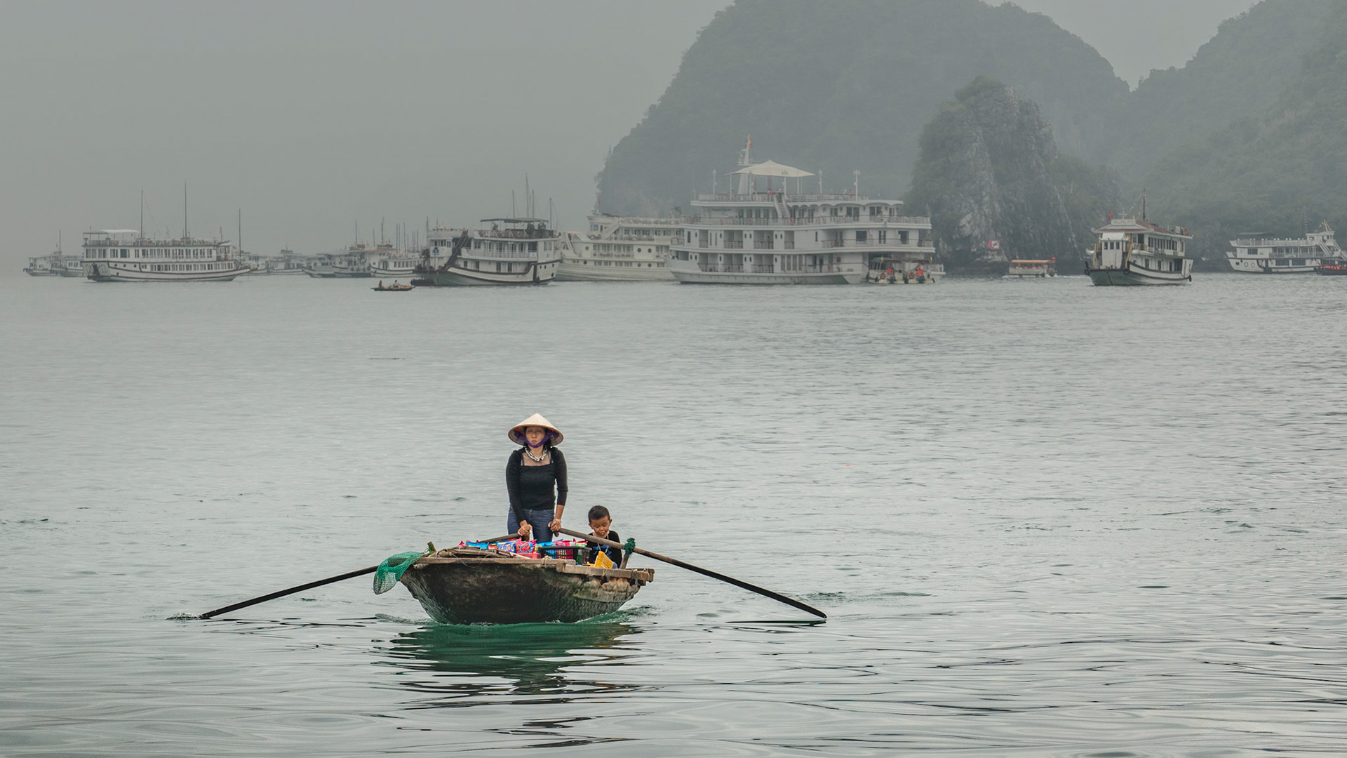 Ha Long Bay-Boat lady selling snacks