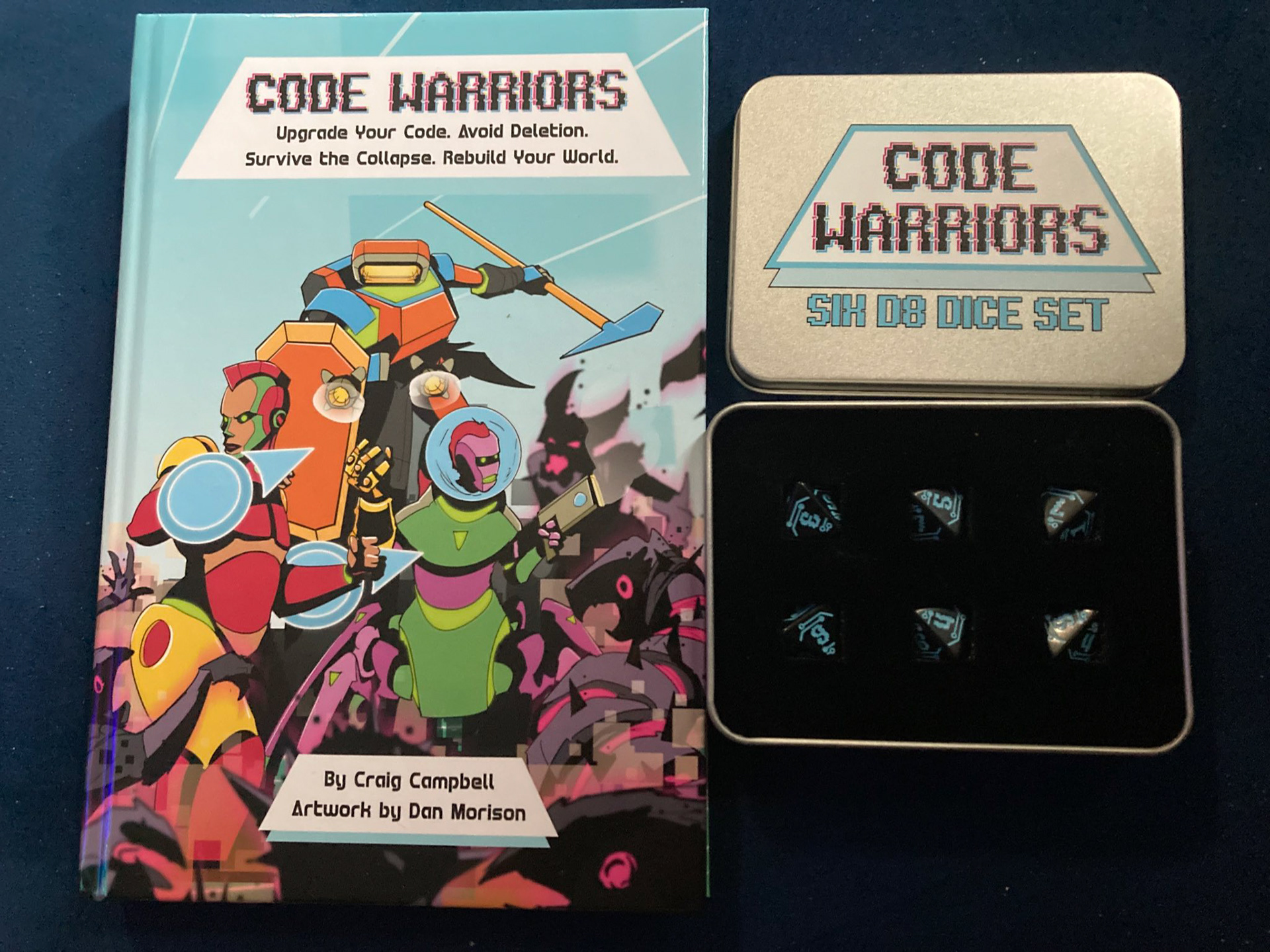 Code Warriors final book and custom dice set designed by Anita