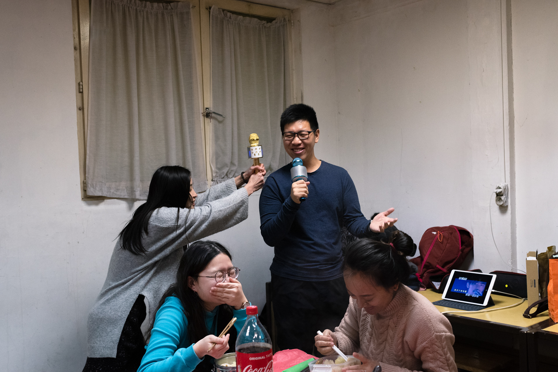 A group of international students celebrate the Lunar New Year with Chinese steamboat and karaoke.