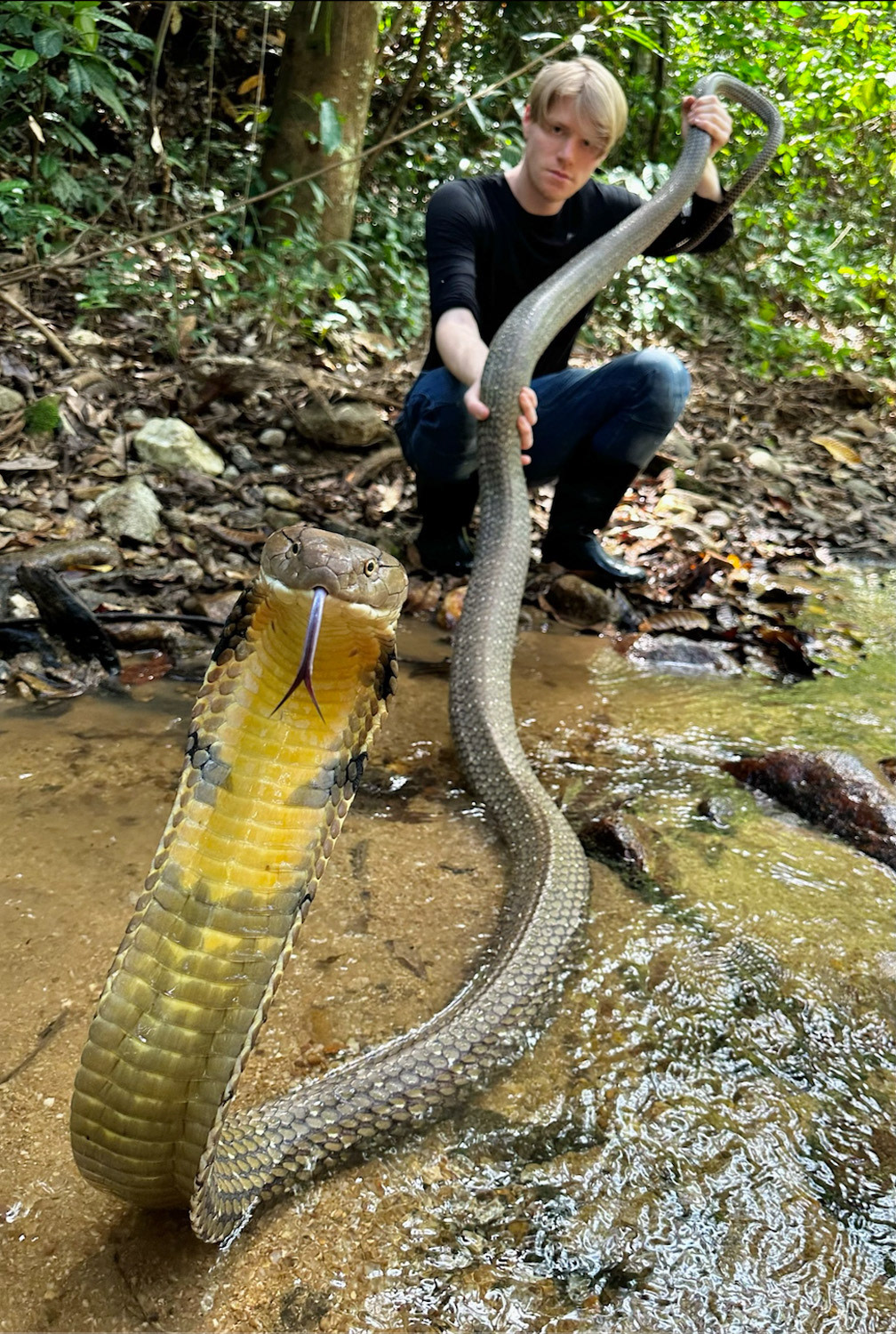 Rupert displaying the size of this magnificent snake.