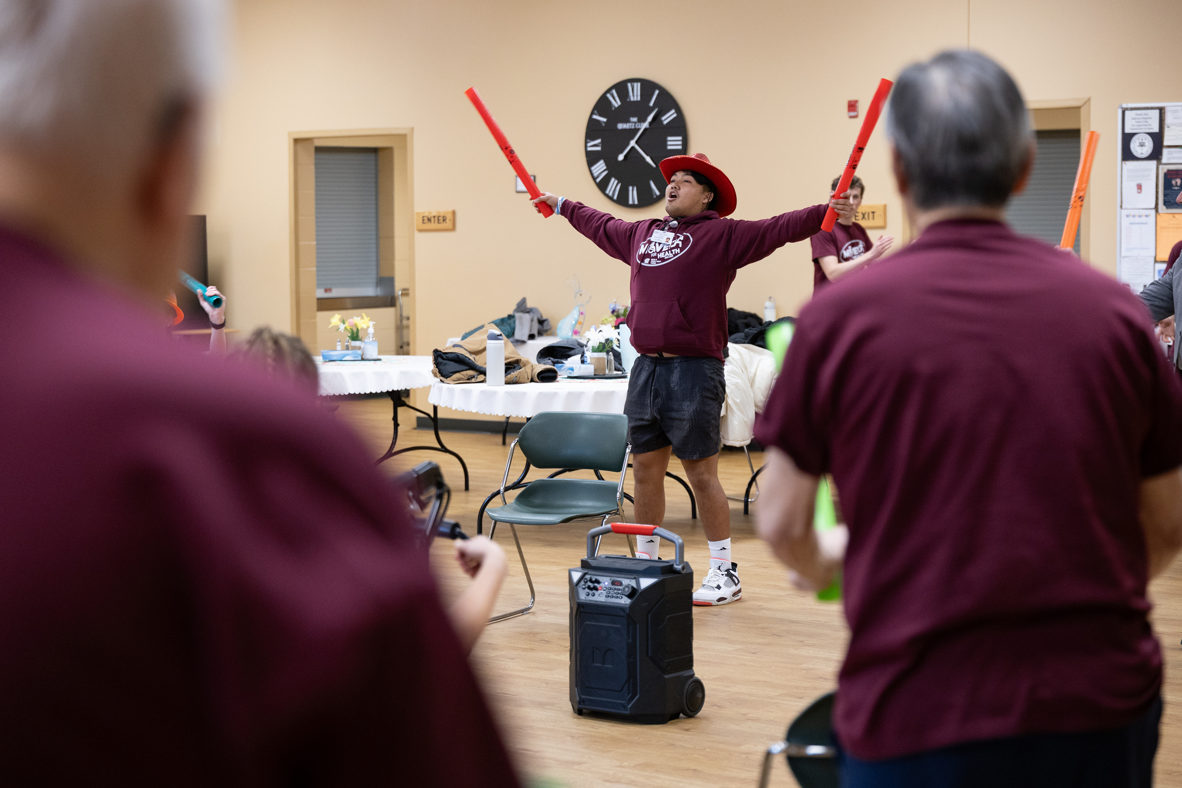 Central Michigan University second-year physical therapy doctoral student Julian Tenerife leads the MOVE! For Health class warm-up at the Commission on Aging, 2200 S. Lincoln Rd., Mount Pleasant, Michigan, Thursday, March 20, 2025.