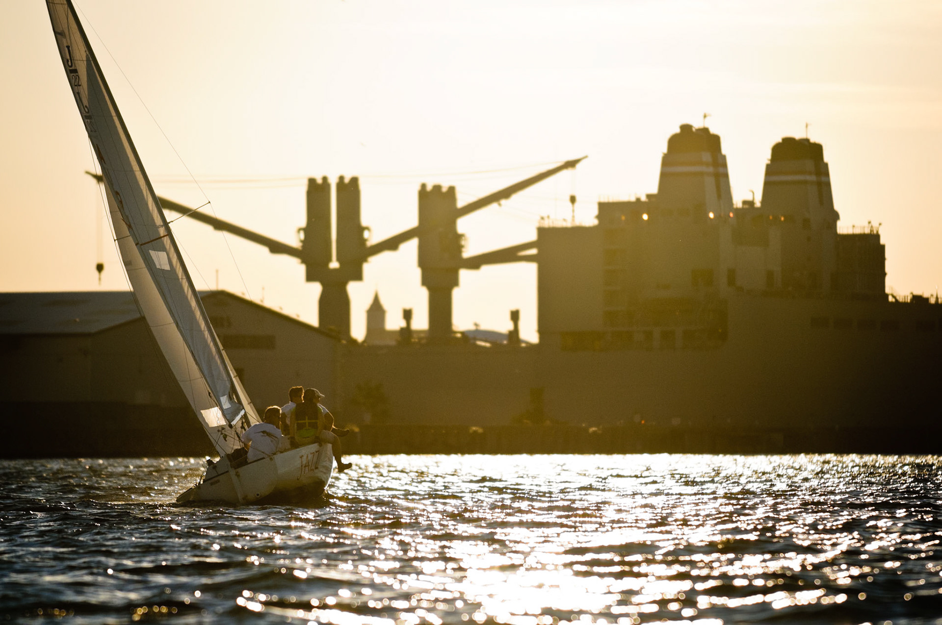 Eying the Layline - The crew of a J/22 eyes the layline to the windward mark.
