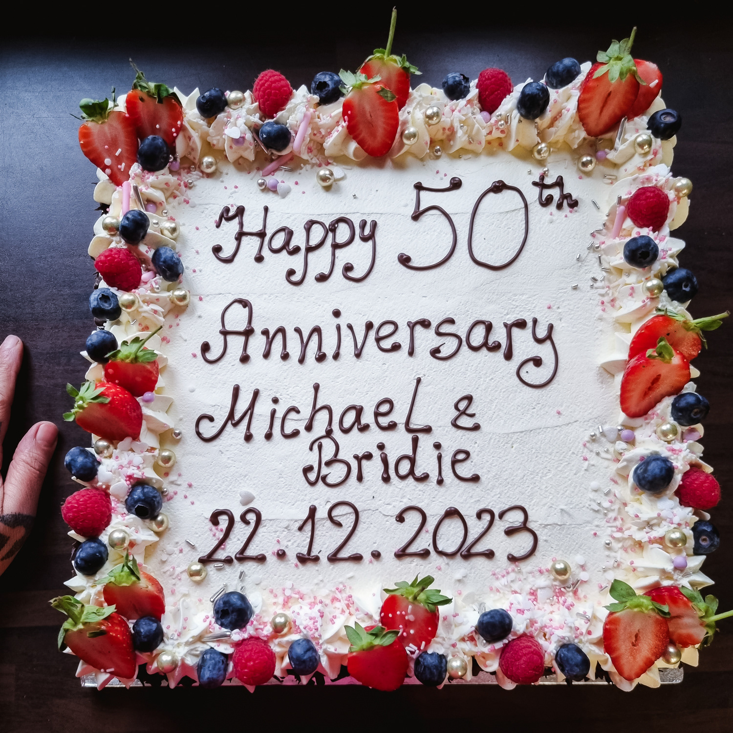 Cream and Strawberries Anniversary cake with message