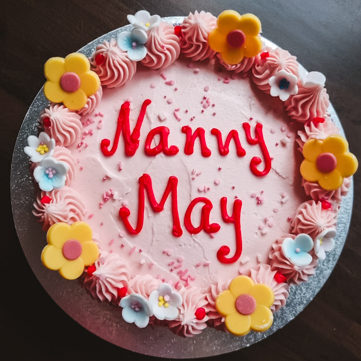 Strawberry buttercream cake with message