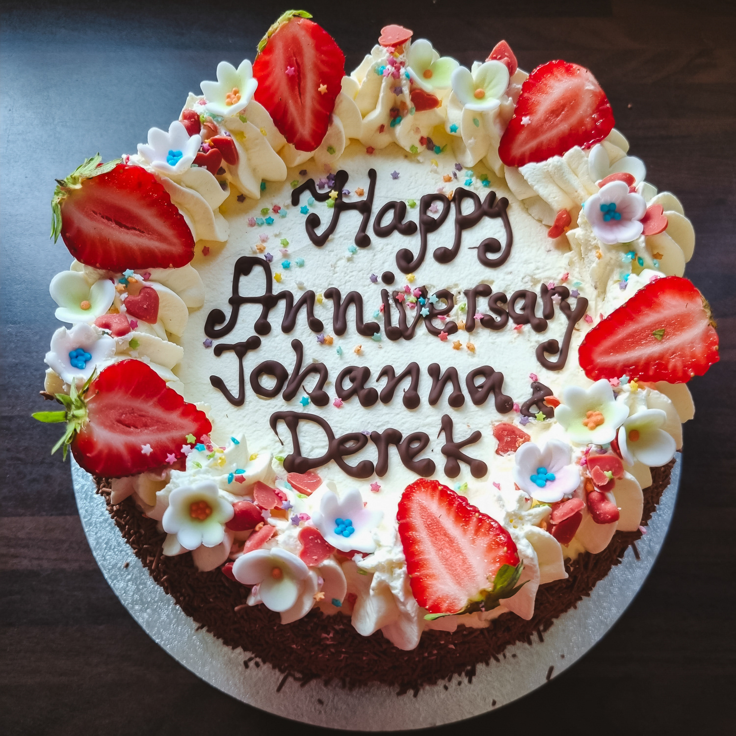 Cream and Strawberries Anniversary cake with message