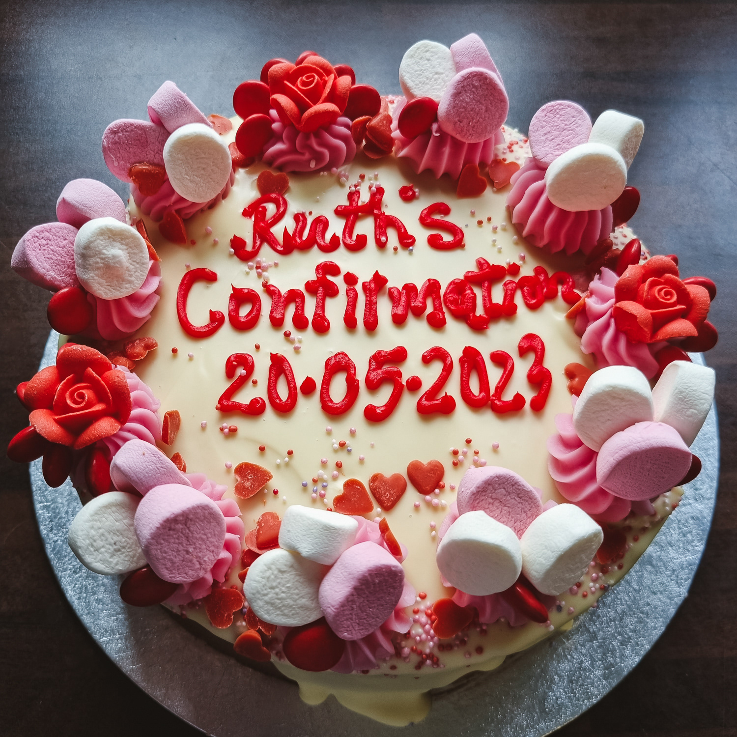 Vanilla buttercream Confirmation cake with message in red