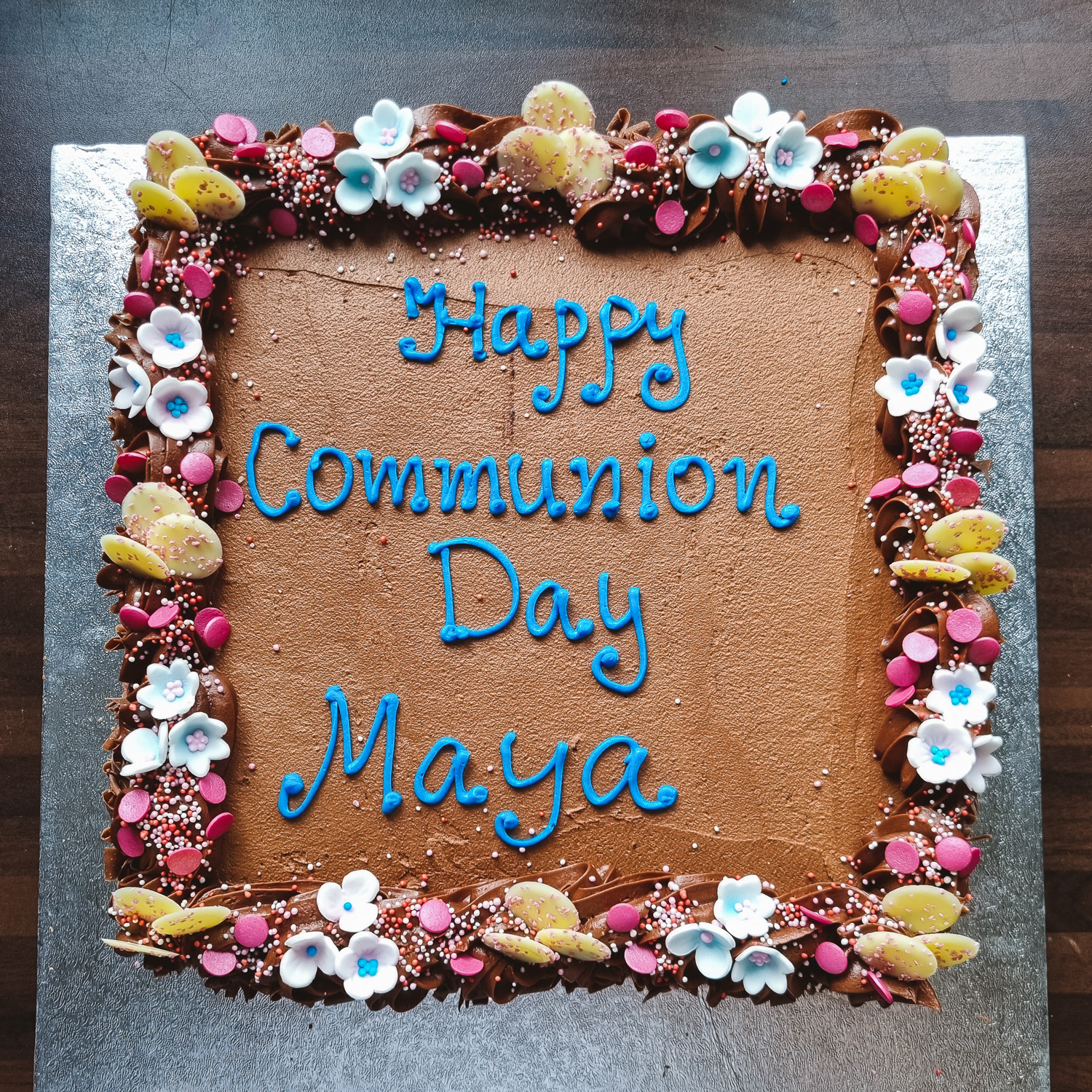 Chocolate buttercream Confirmation cake with message in blue colour