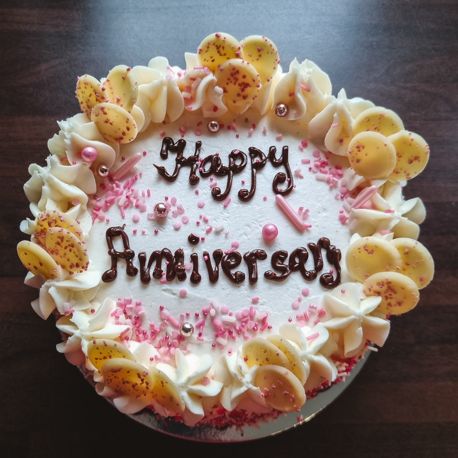 Cream and Strawberries Anniversary cake with message