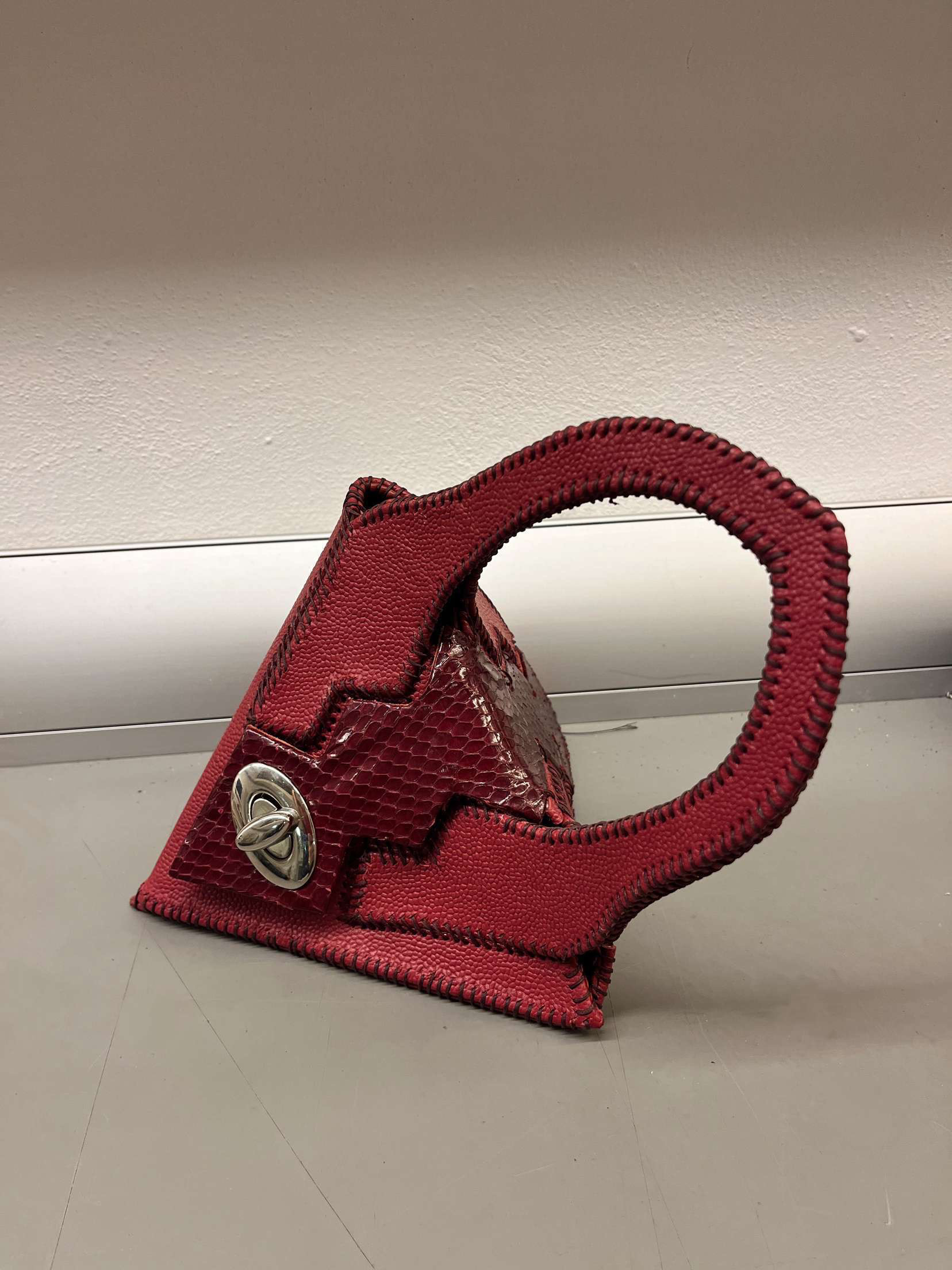 Produced in Italy; completely hand-stitched and made with authentic Chanel leathers