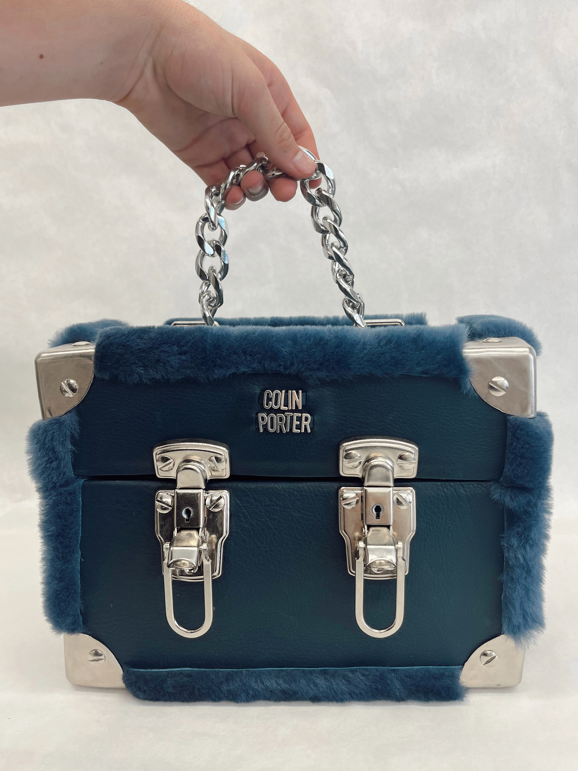 Trunk box bag made with faux fur and calfskin