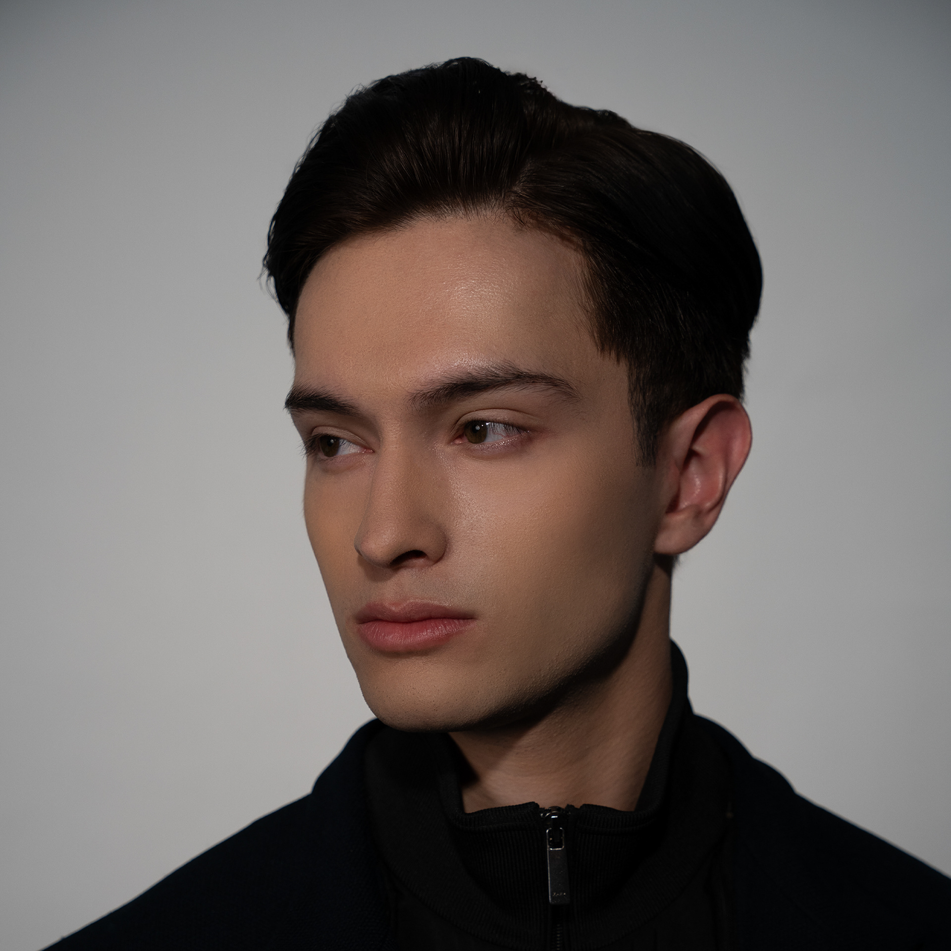 Zoom out the the whole picture, to shows more of his shoulder