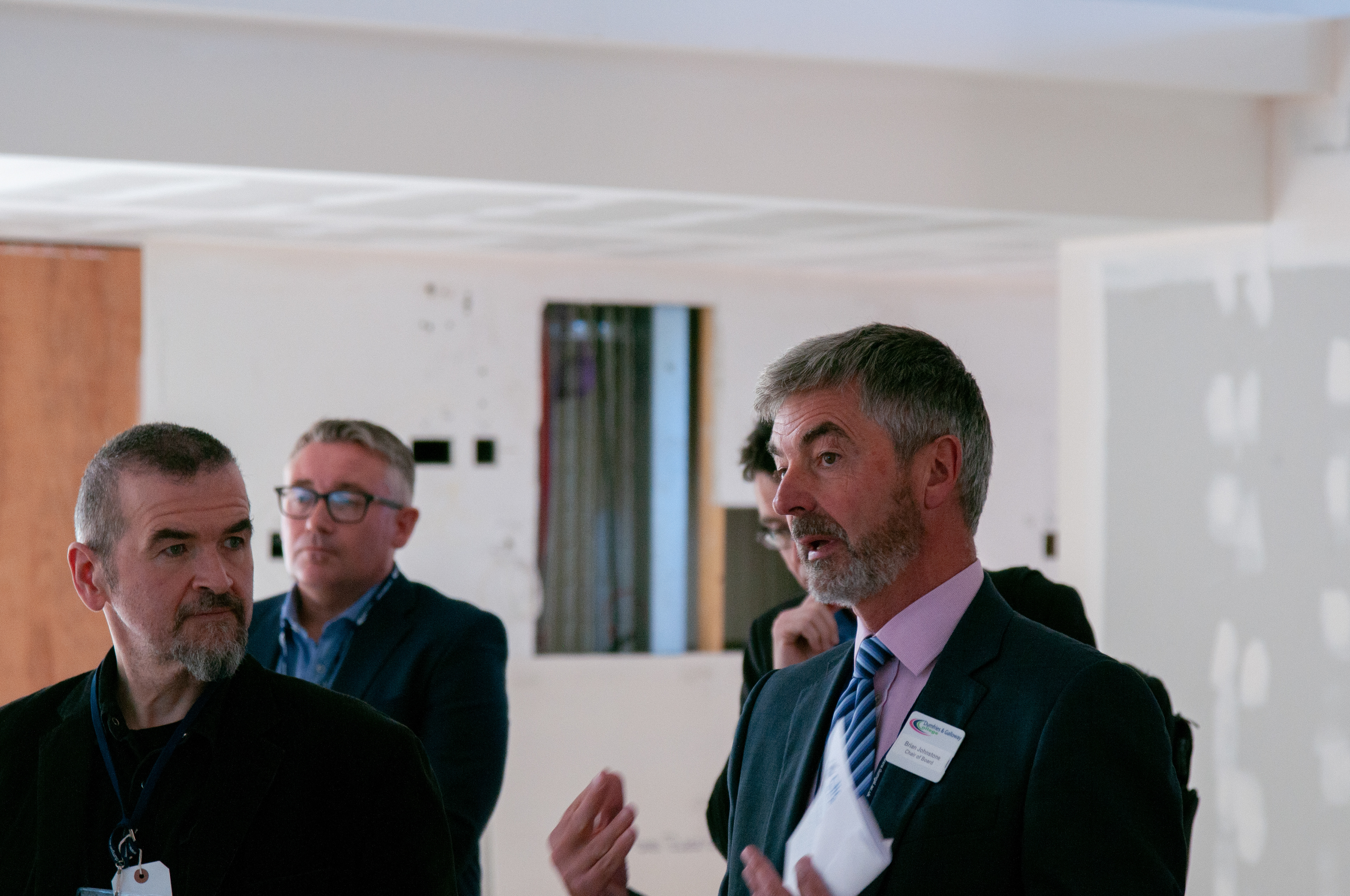 Chair of the Board, Brian Johnstone talking to guests as part of their tour of new college facilities.