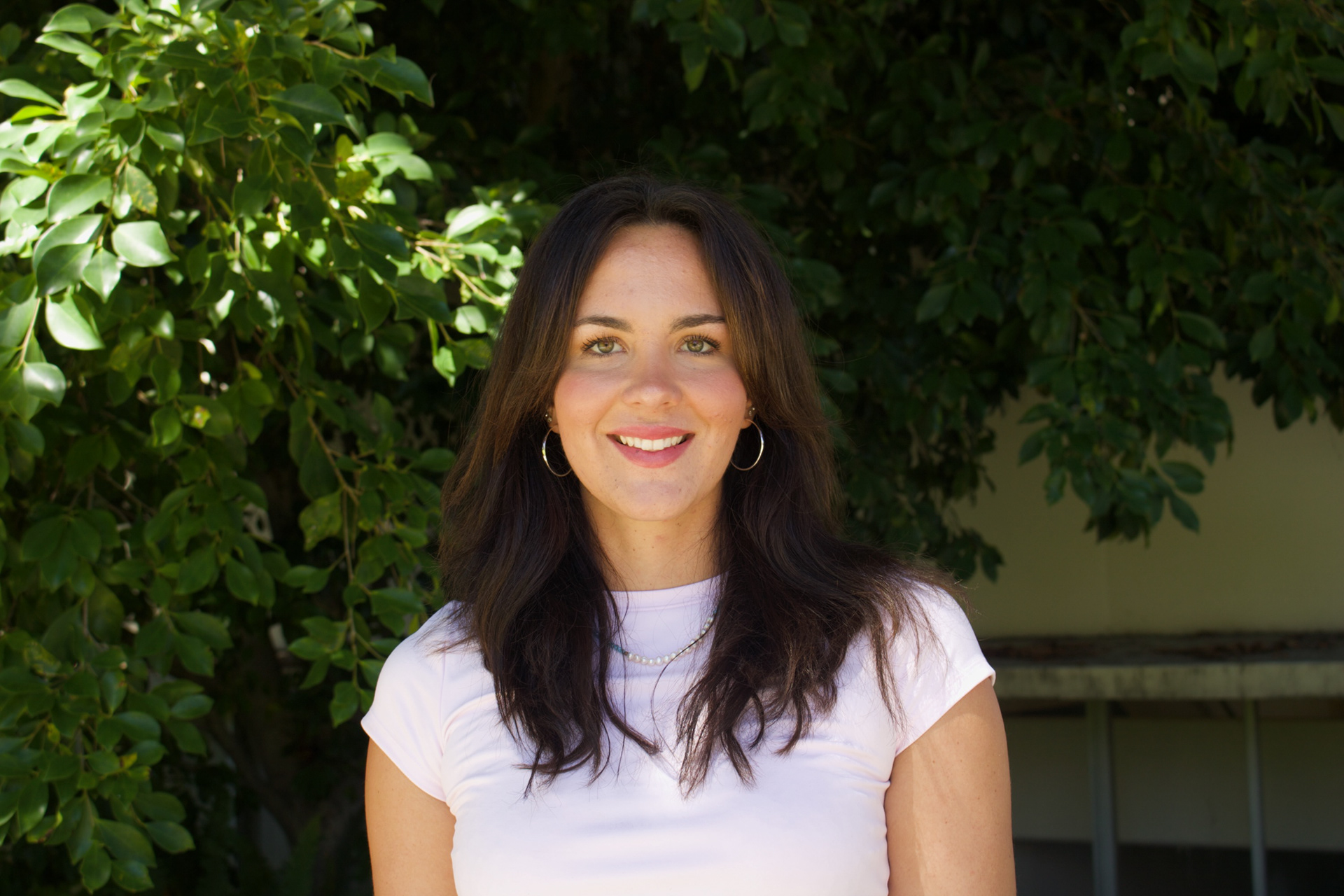 Adrielle Hasara, Journalism Student, San Diego Diego State poses for headshot taken by student photographer 