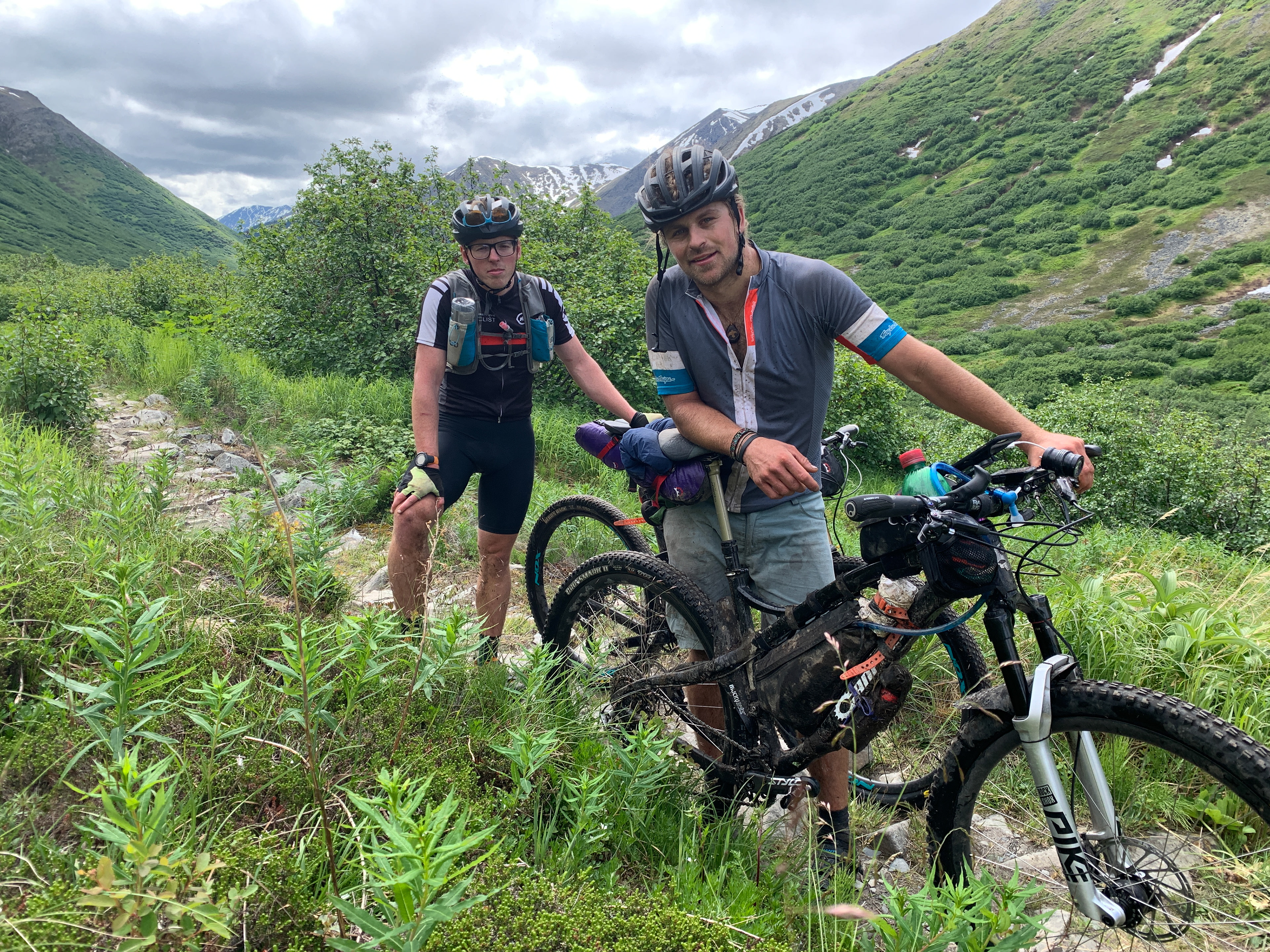 When you offer some beat up looking-riders you're passing a Coke, but they can't accept because they're busy winning a self-supported race. 