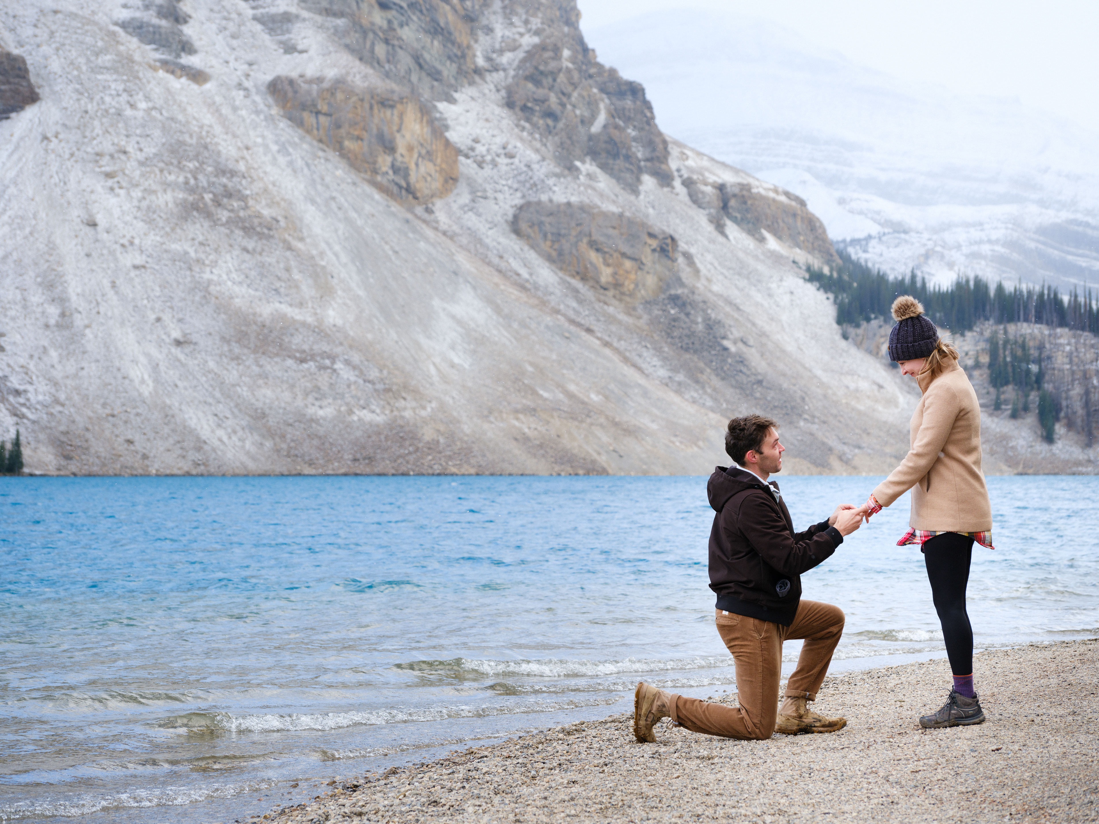 Man asking for a woman's hand in marriage in the Canadian Rockies