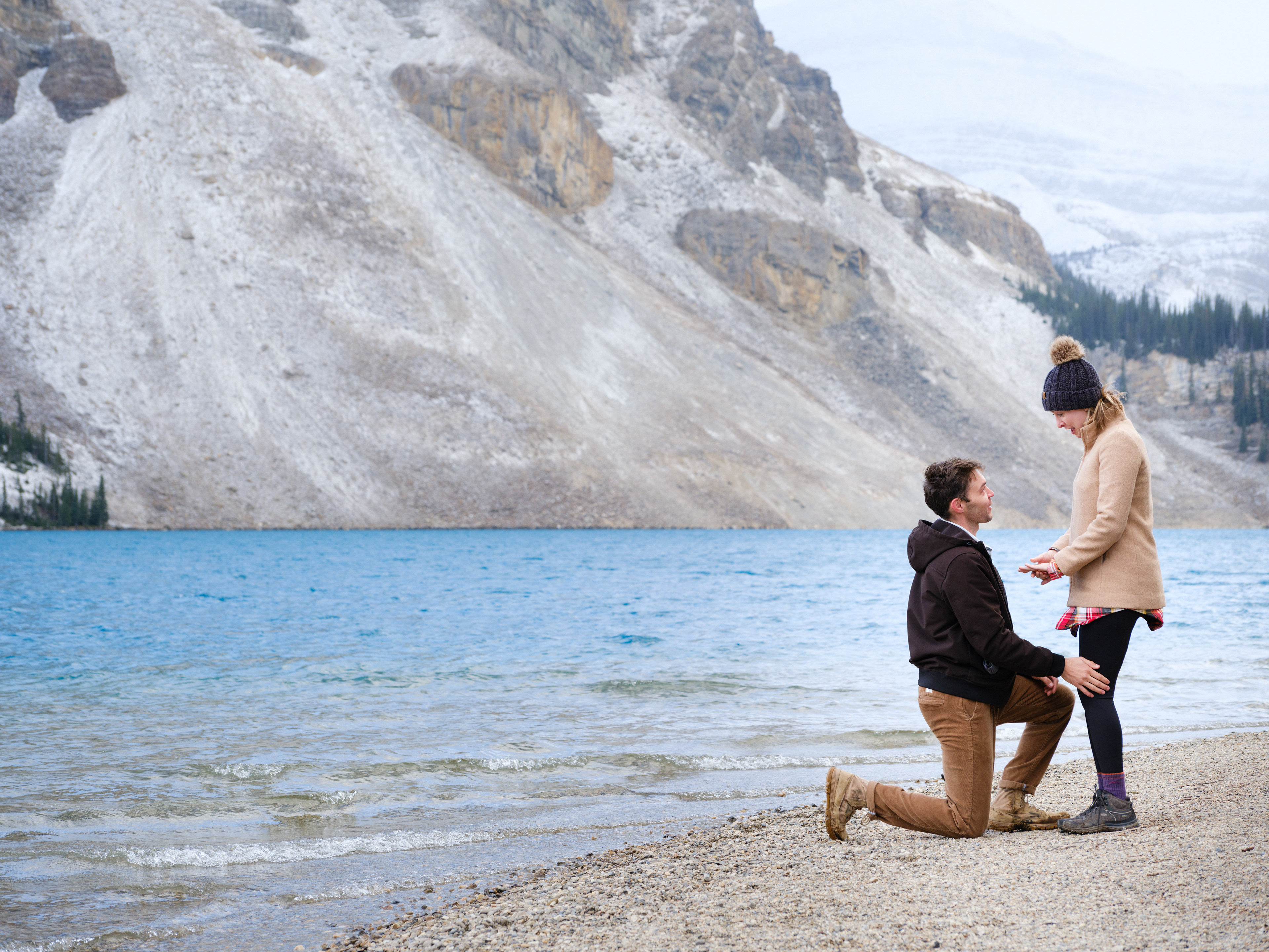 Surprise proposal in Banff and she is checking out her new engagement ring.