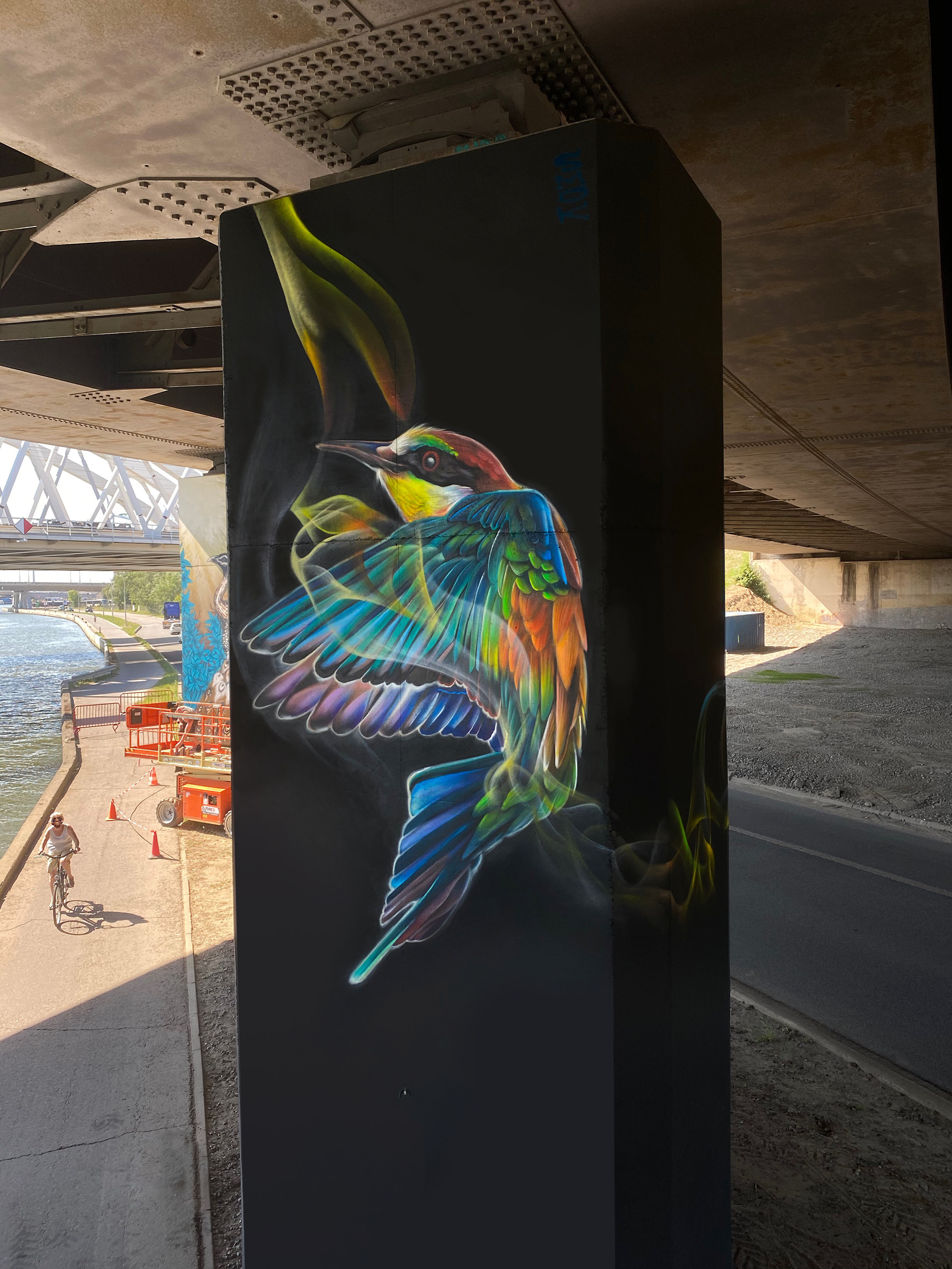 colorfull bird in memory of the death of Julie Van Espen