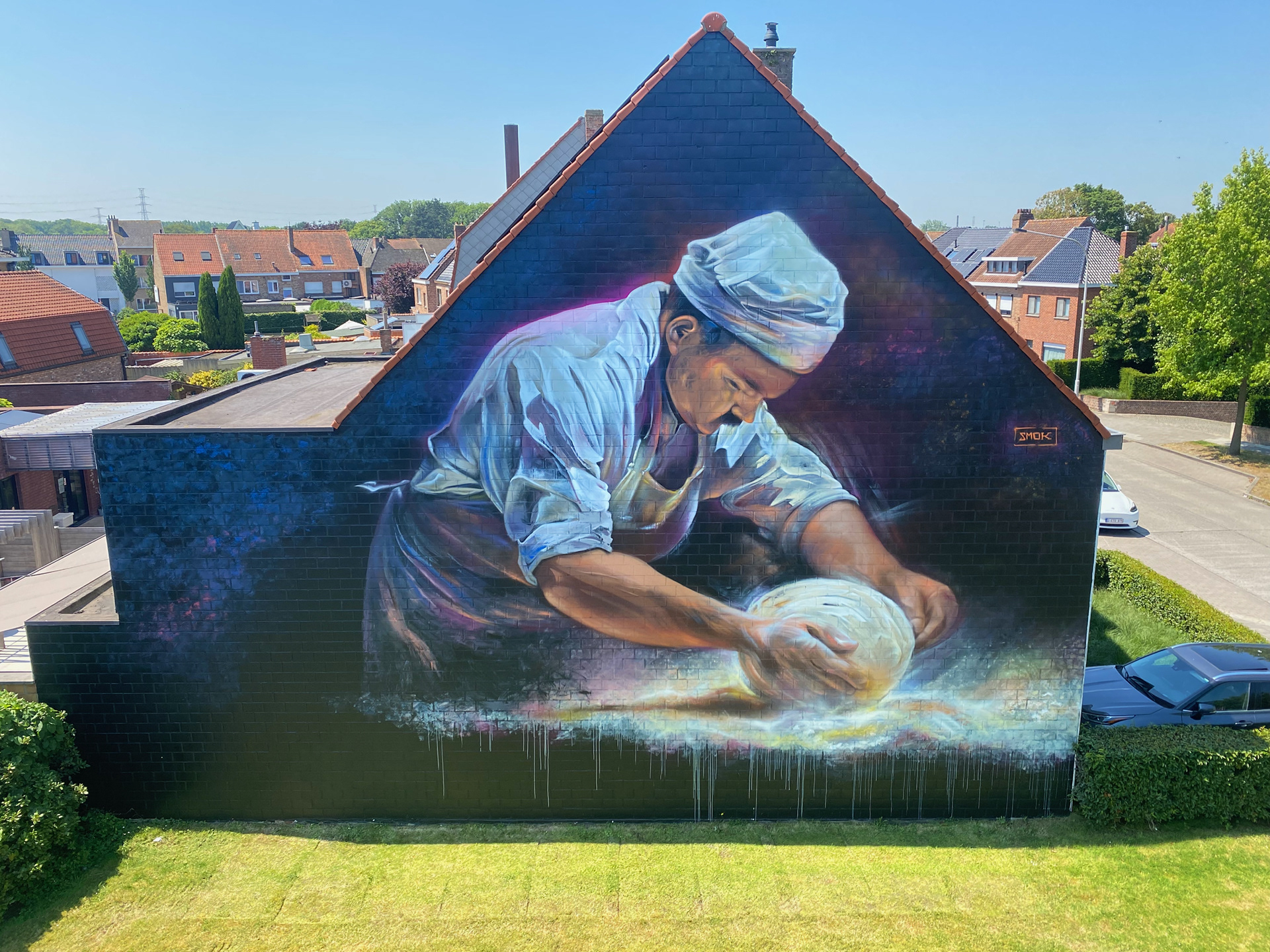 ‘Bread and Brushstrokes’ a wallpainting by SMOK for The Bridges streetart festival 2024