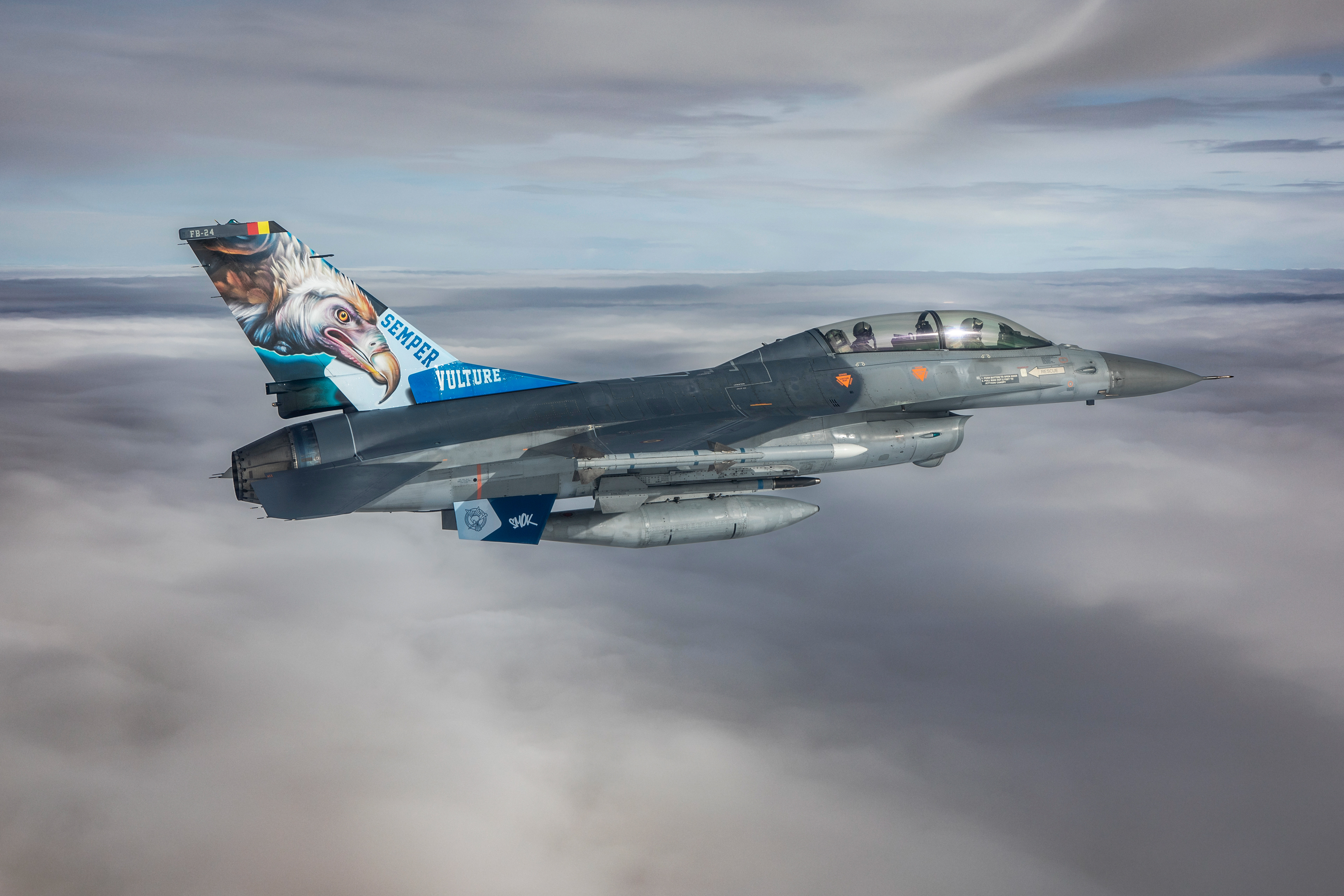 A vulture painted on the tail of a Belgian F16 by SMOK