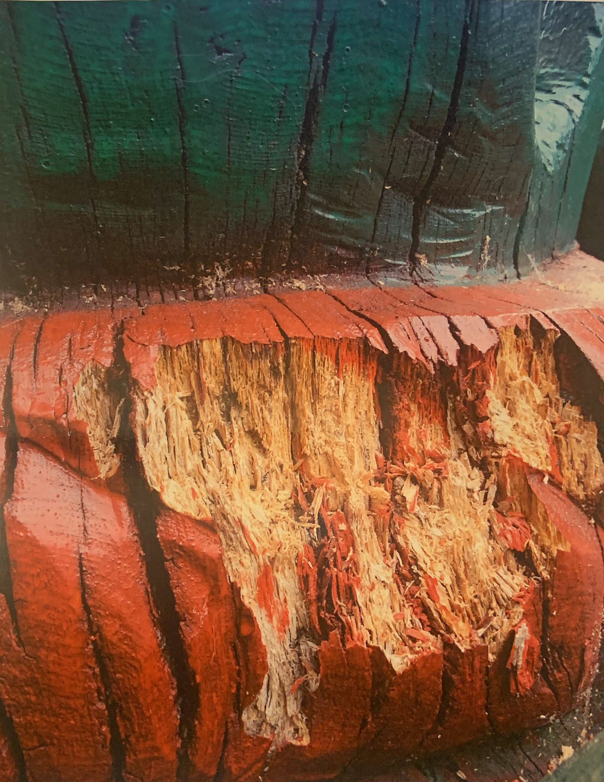 a picture i took from a group session of a wooden sculpture which has been weathered and worn to leave it decaying
