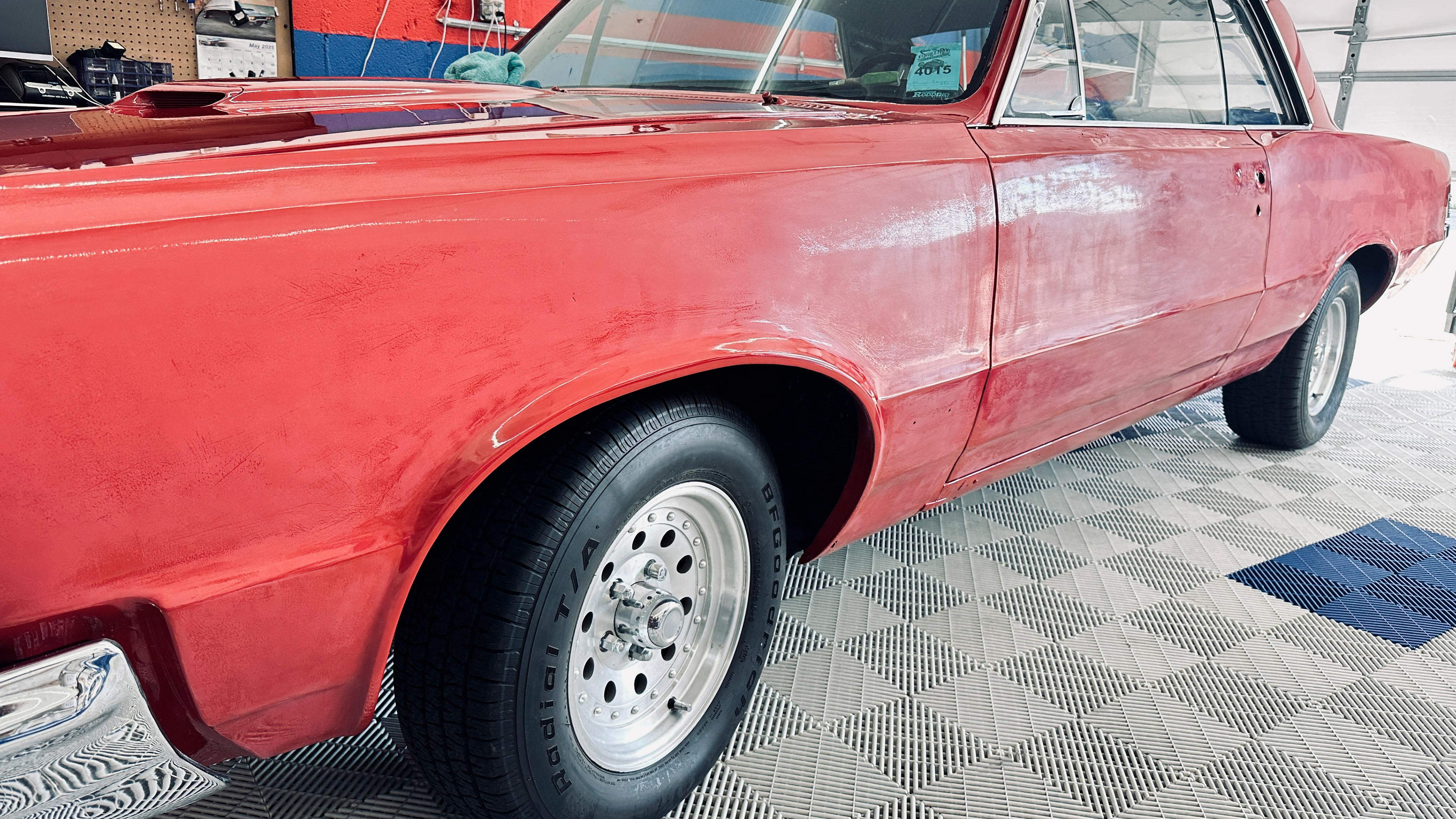 The Challenge: Excessive orange peel and surface texture from a poor application made the red look dull and "milky."