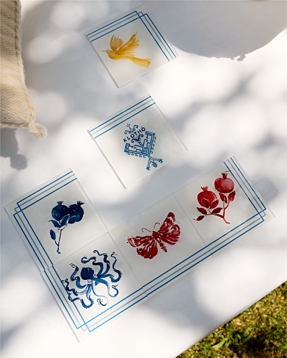 Elements of the illustration extended into homeware, including coasters and a serving tray.