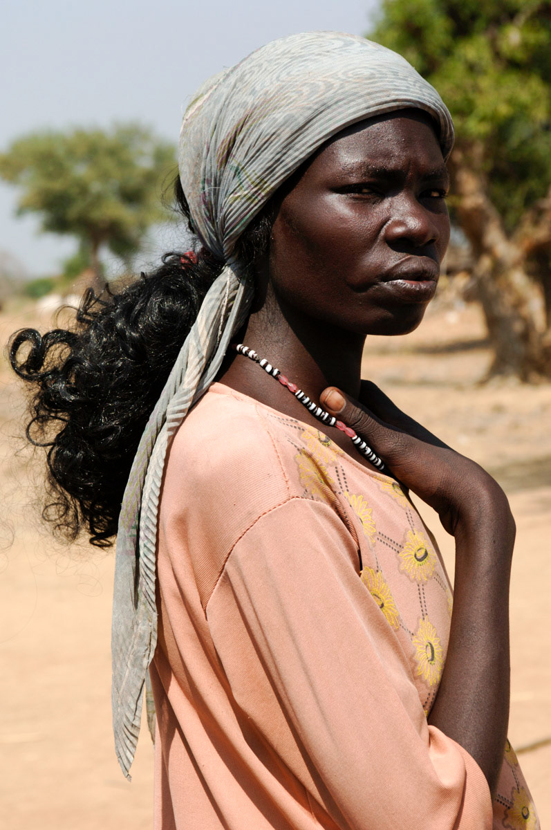 Southern Sudanese woman returns home after the civil war