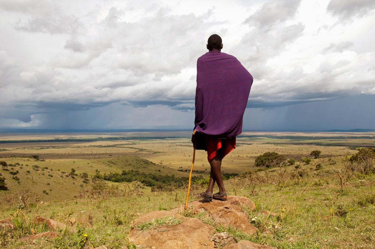 A Maasai man looks over Kenya's Masai Mara National Reserve.