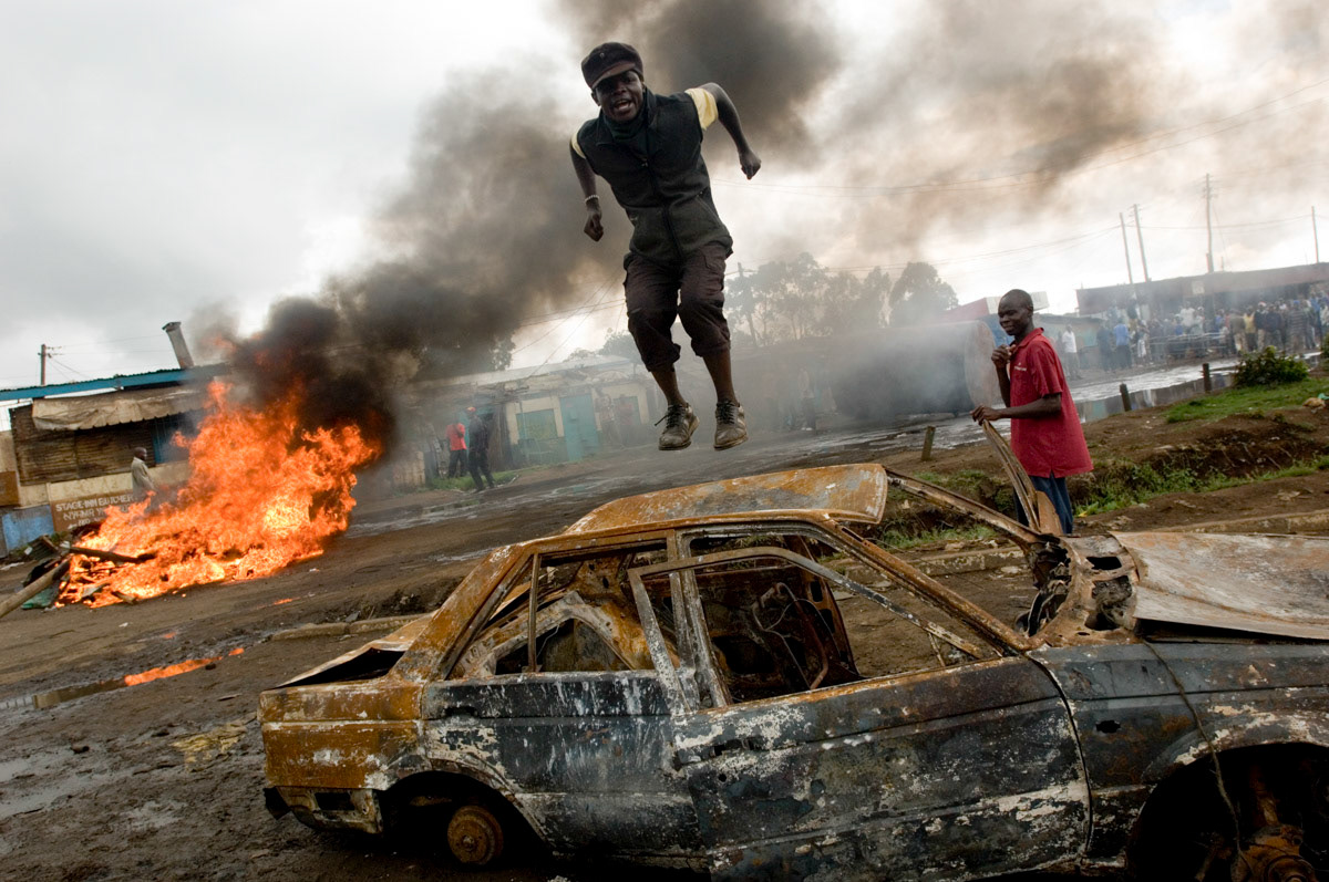 A man protests in Nairobi's Kibera slum, against police attempts to block rallies called by the losing opposition Orange Democratic Movement following Kenya's disputed 2007 general election.