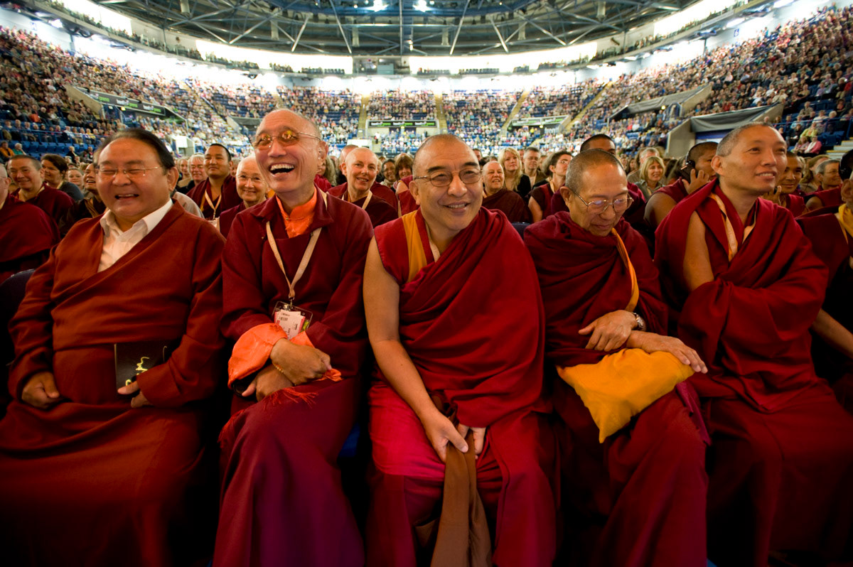 Tibetan lamas enjoy a joke shared by His Holiness the Dalai Lama in Nottingham, 2008.