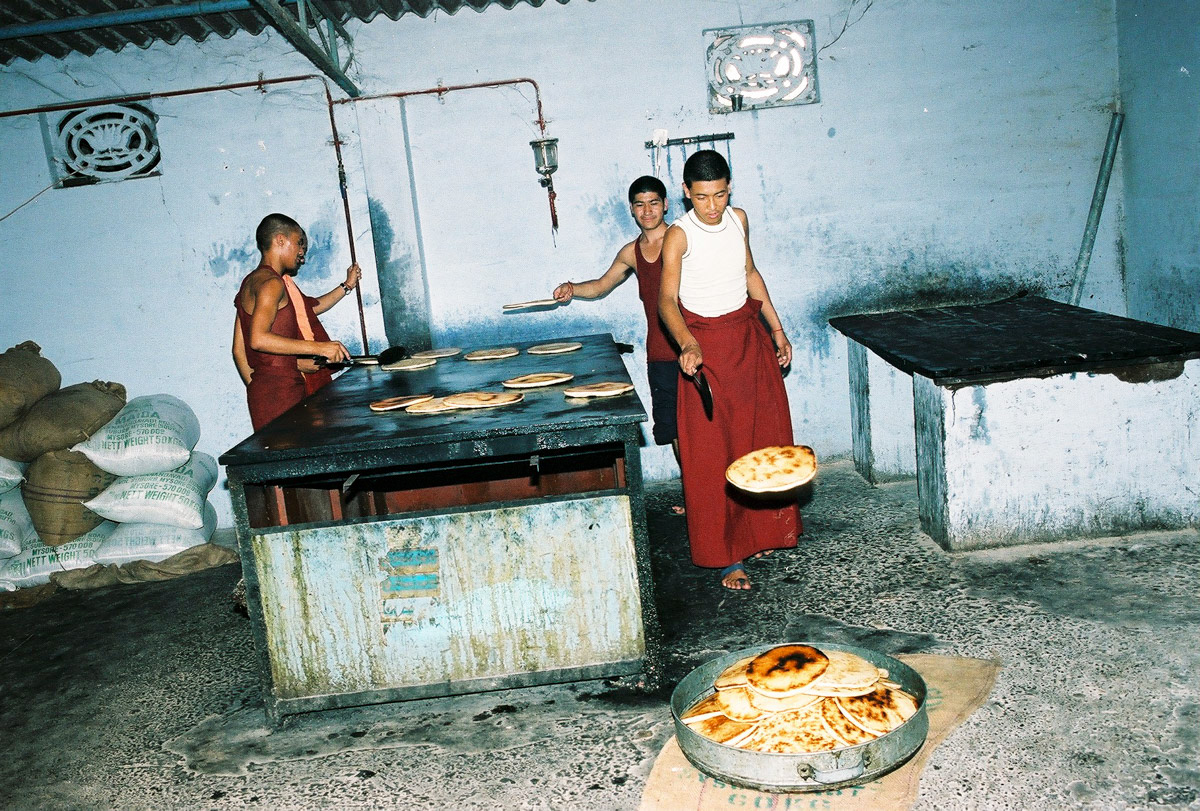 Monks prepare bread at Tashi Lhunpo Monastery, India