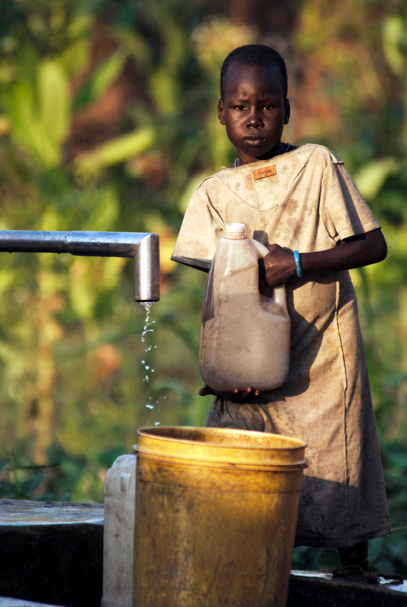 A girl collects water in Southern Sudan.
