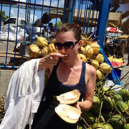 Eating fresh coconuts in Trinidad